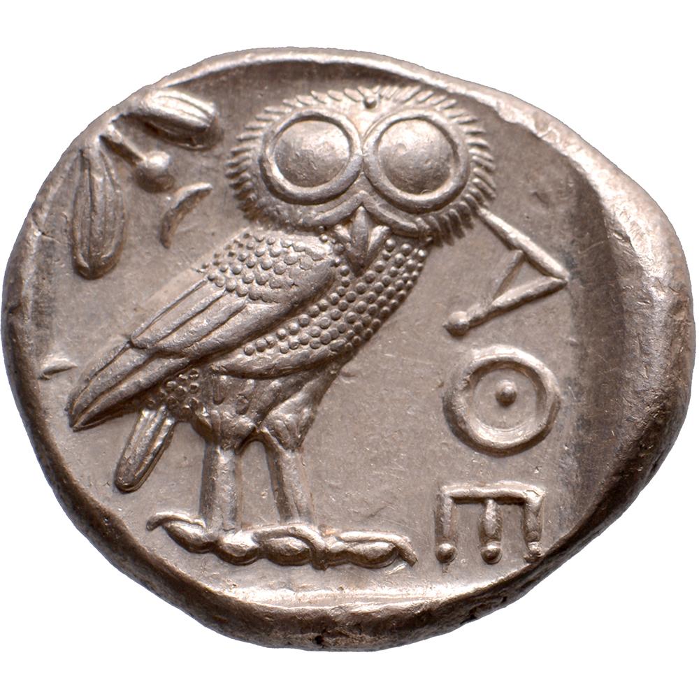 Obverse: head of Athena right, wearing earring, necklace, and crested Attic helmet decorated with olive leaves over visor and spiral palmette
Reverse: owl standing right with head facing, olive sprig with berry and crescent in upper left field, AΘE