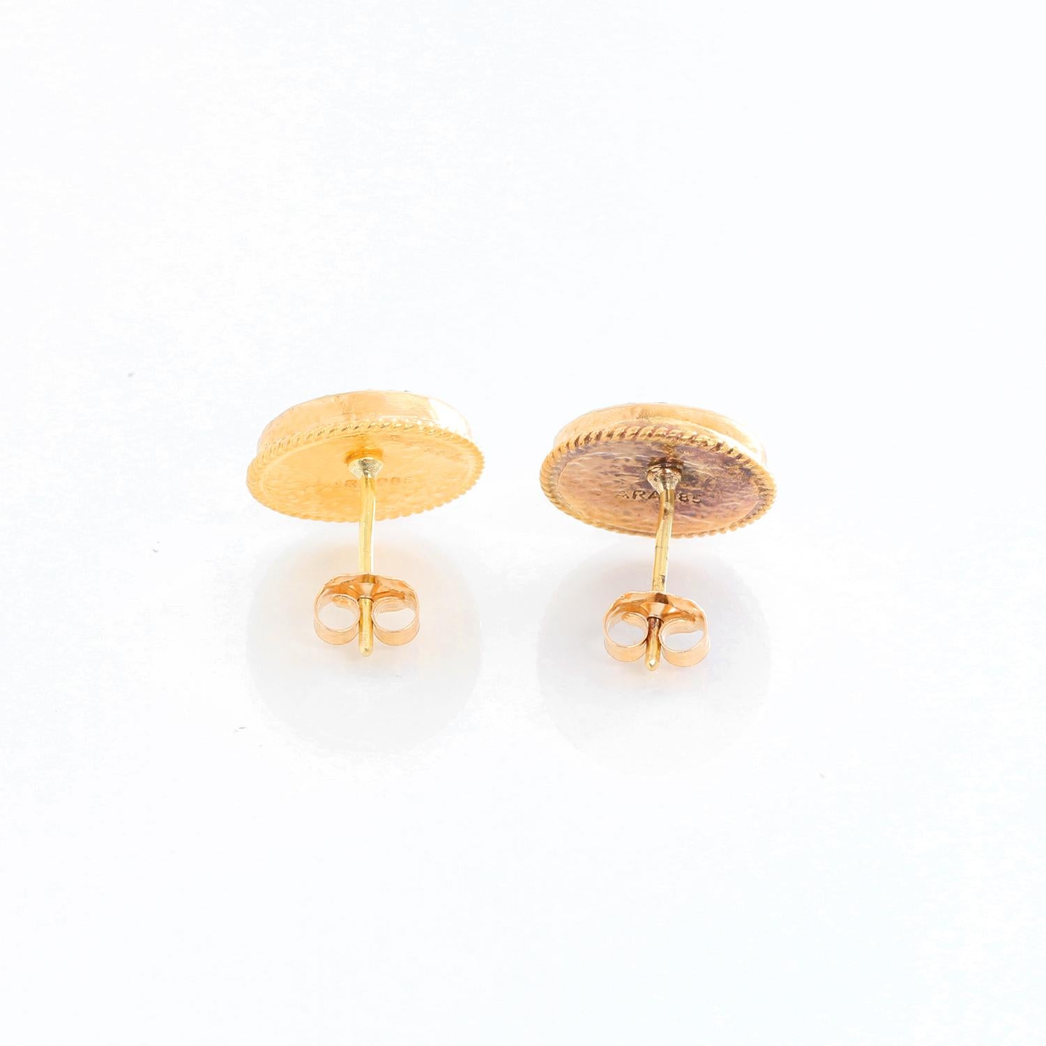 Ara 14K Yellow Gold and Sapphire Diamond Studs  - Round stud earring with white sapphire center stone and pave diamond halo in luxurious 24k yellow gold and oxidized silver. A perfect everyday stud that has a distinct designer look.  Pre-owned with