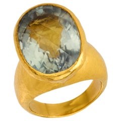 ARA Anillo de cóctel de oro amarillo de 24 quilates con aguamarina de 17 quilates