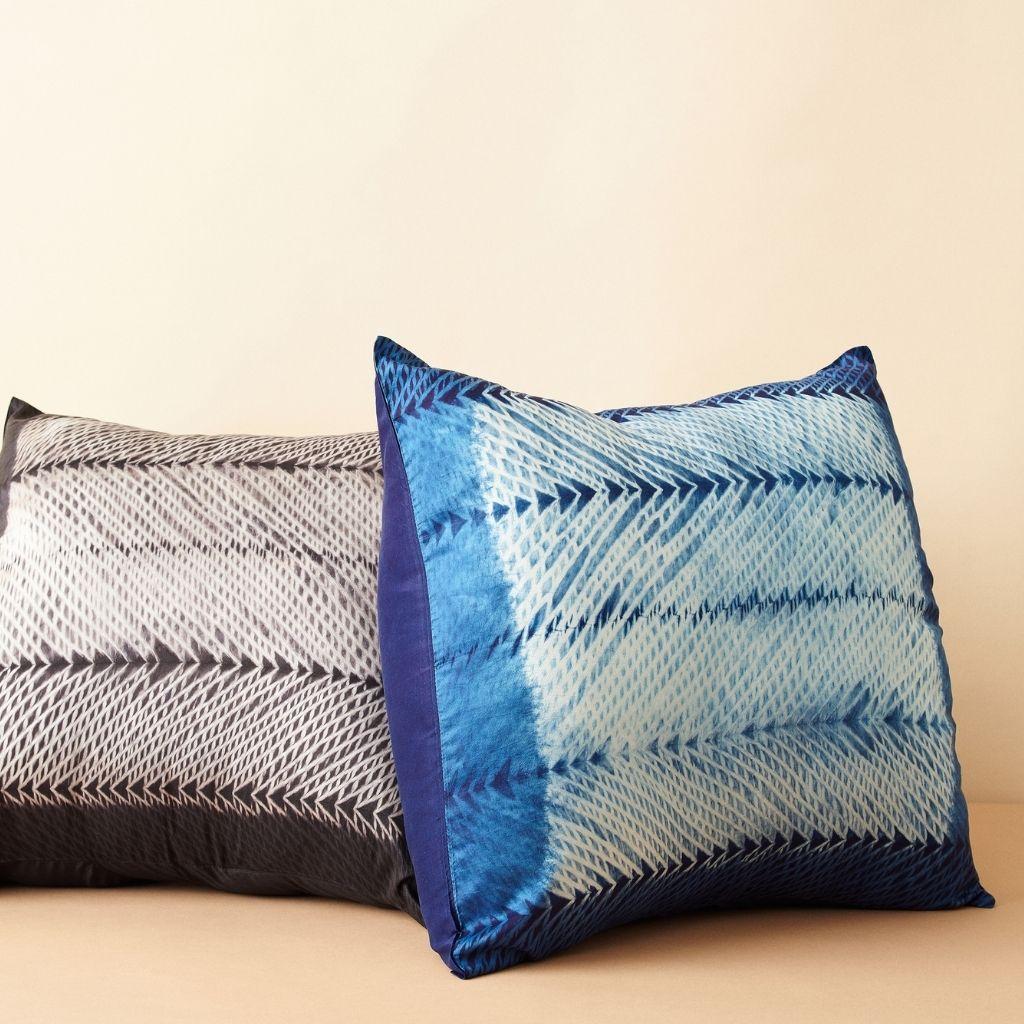 Custom design by Studio Variously, ARA Indigo Pillow is handmade by master artisans in India. A sustainable design brand based out of Michigan, Studio Variously exclusively collaborates with artisan communities to restore and revive ancient