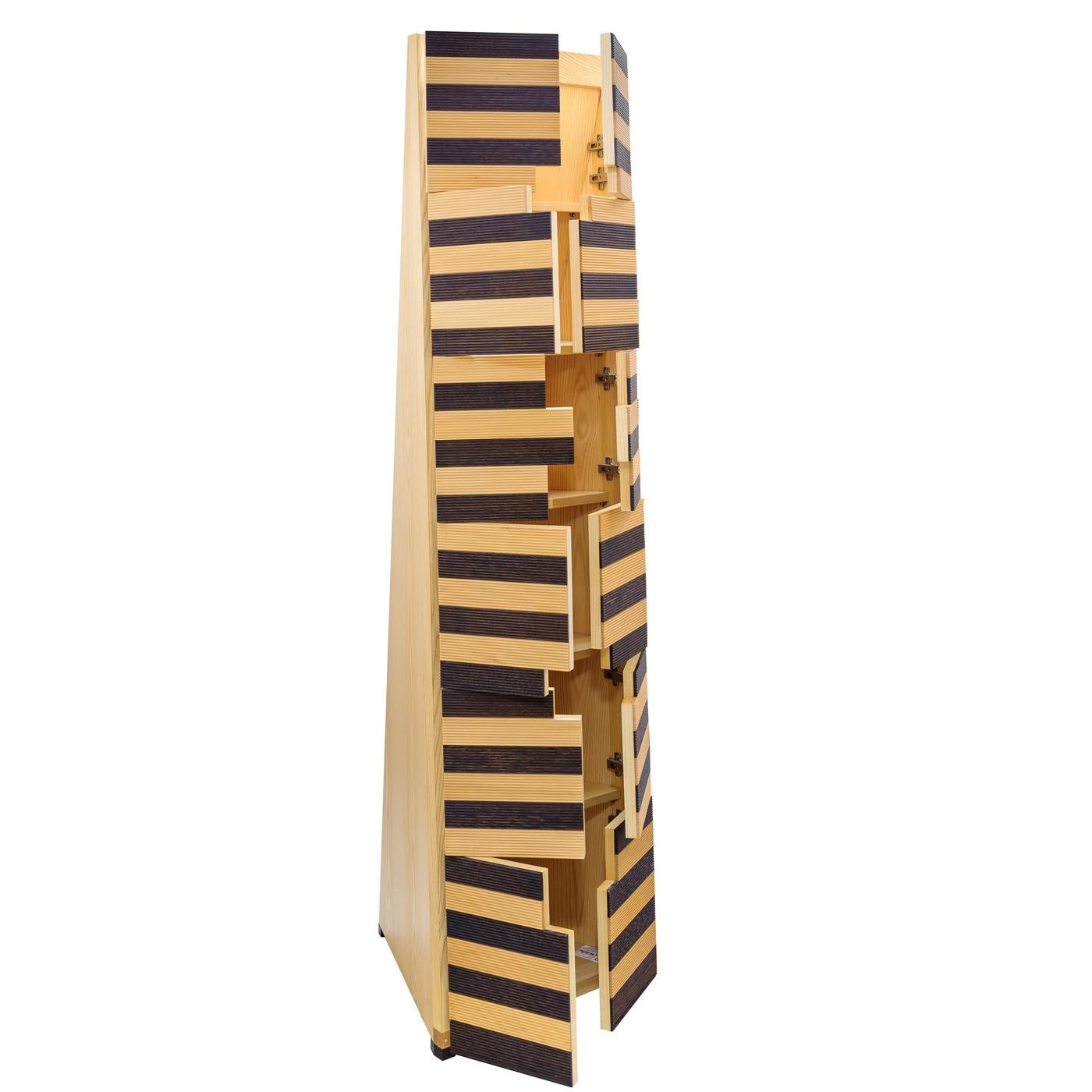 Reminiscent of Bauhaus furniture, the sleek lines and bold forms of this striking cabinet will bring a sophisticated accent to a modern living room. This cabinet has a trapezoidal base made of ash that supports a structure of alternating planks of