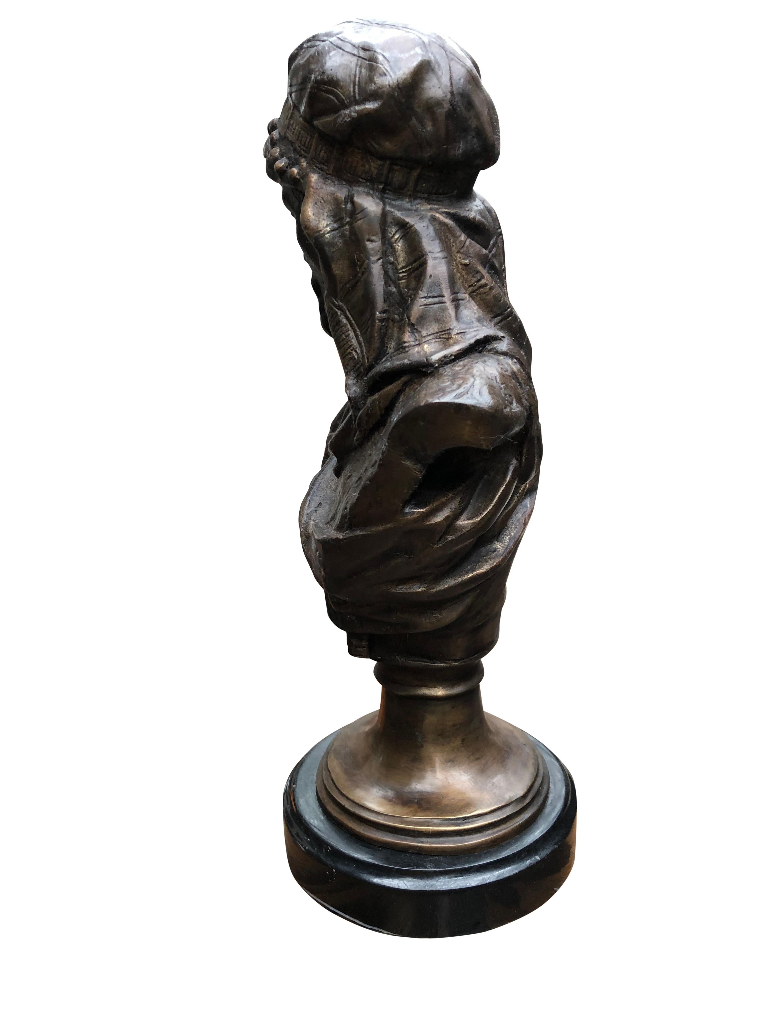 A superb Arab man bronze sculpture, 20th century. Incredible detail of the bronze with a stunning patina finish. Stands on a round marble base. Offered in excellent condition.