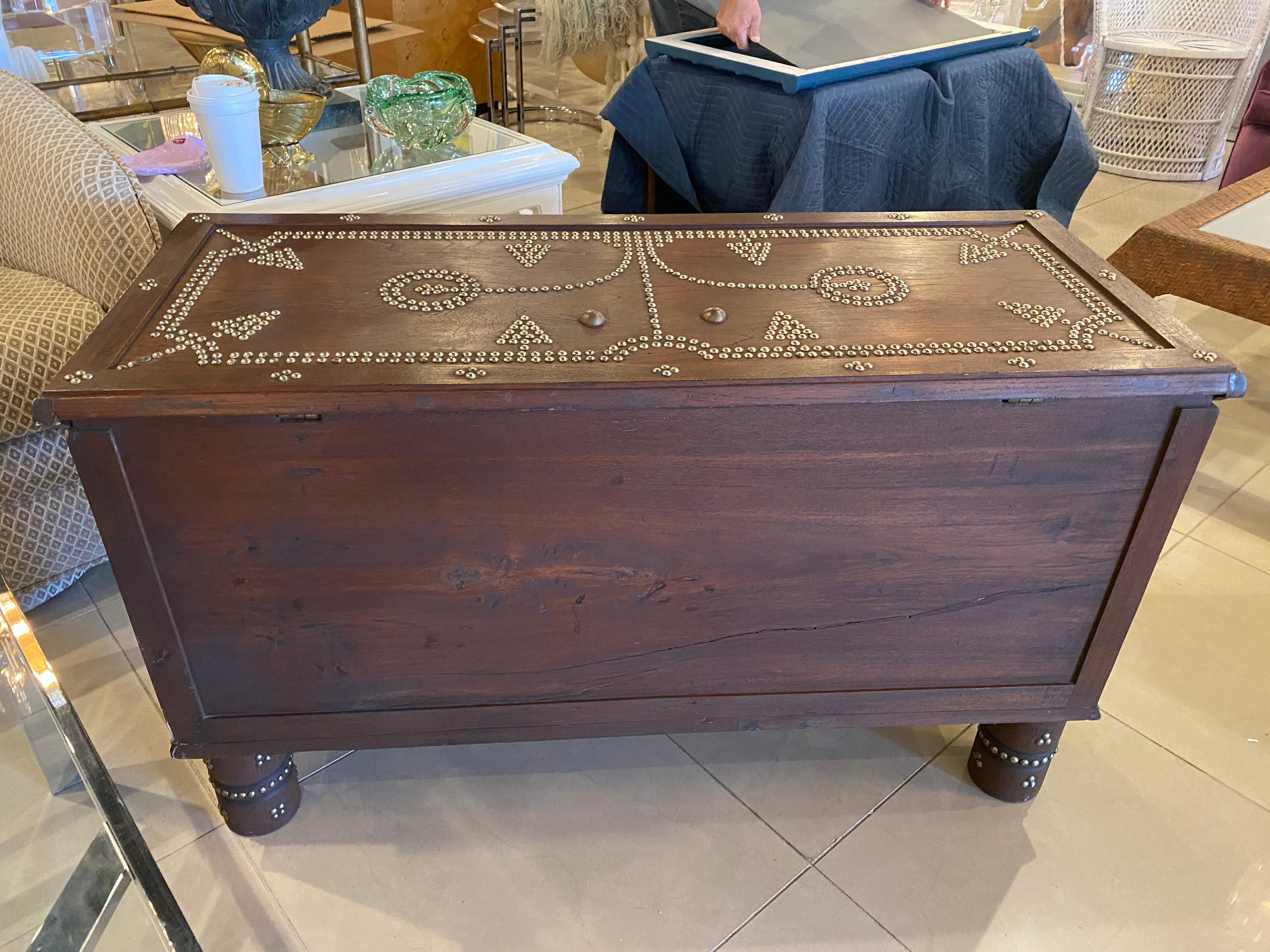 Lovely rare Zanzibar trunk, 19th century. Brass studded decorations all-over with brass clad panels. Three bottom drawers and top opens for storage as well. These were used in Kenya and Zanzibar to store valuables and spices in the 18th and 19th
