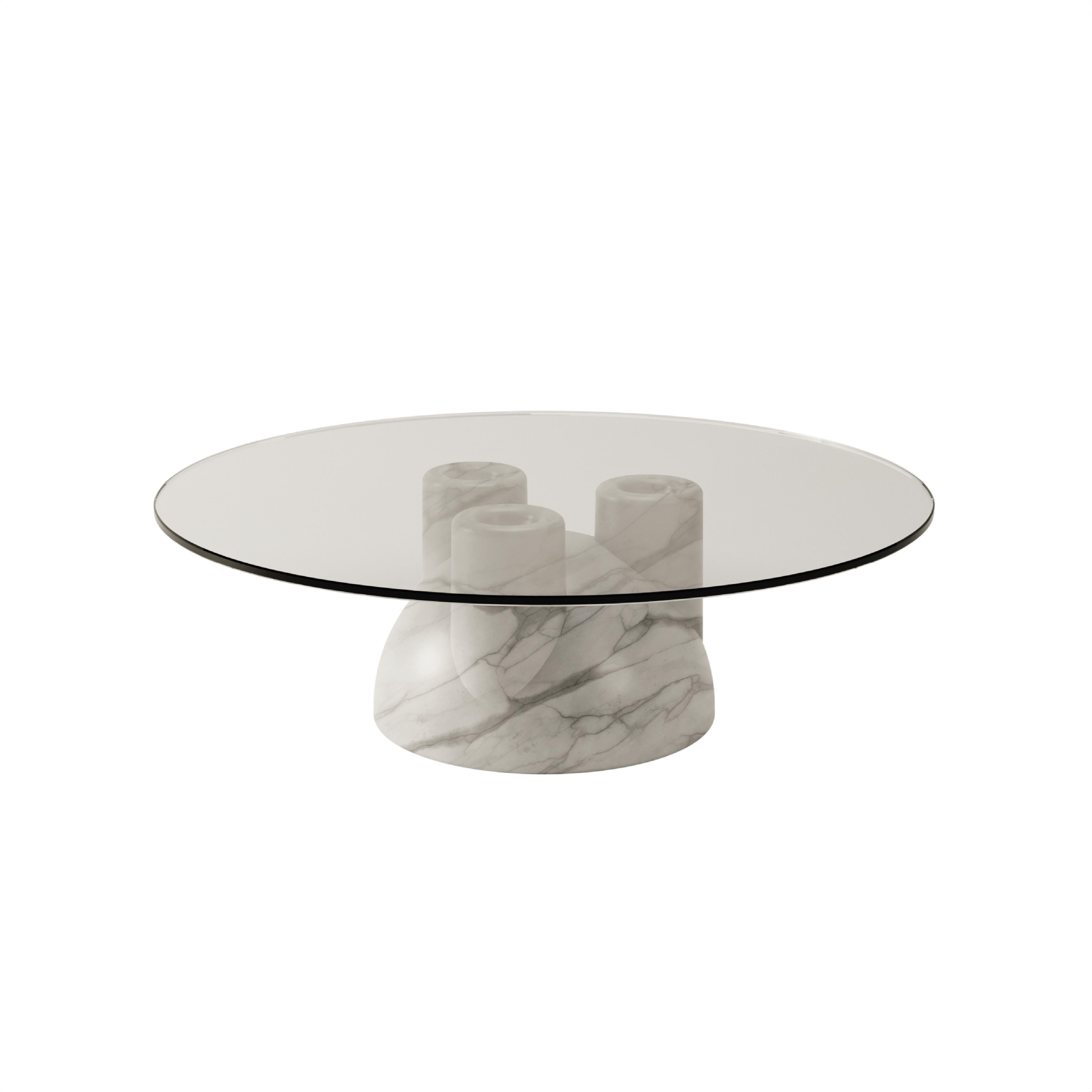 Clean lines, simple geometry and strong materiality are the main features of BURGIO's U line. tAAAble is a reversible coffee table carved from a single piece of marble so the veining flows seamlessly across the unique shape of the table base.