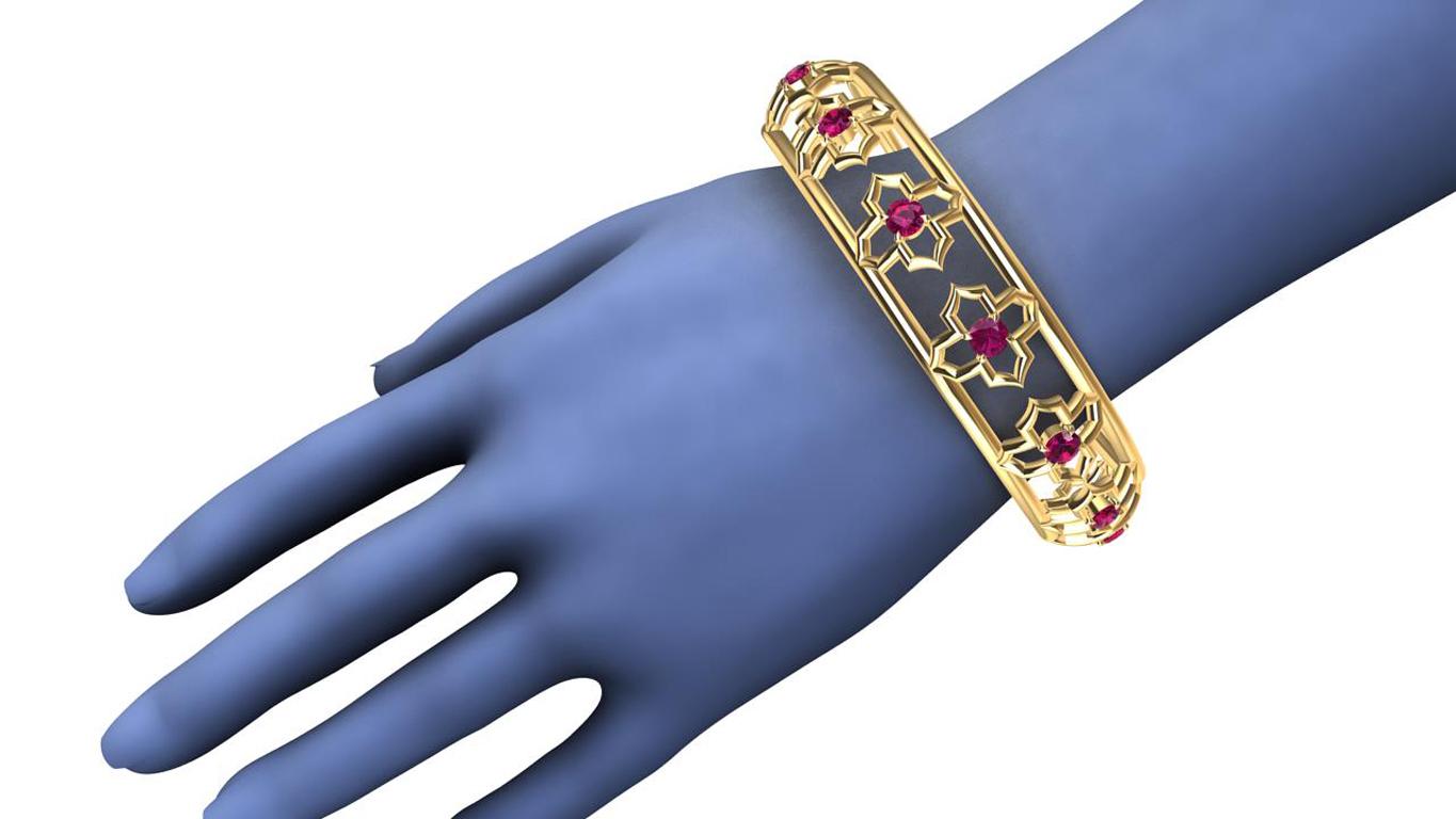 Taille ronde Bracelet jonc en or jaune 18 carats avec arabesques et rubis en vente