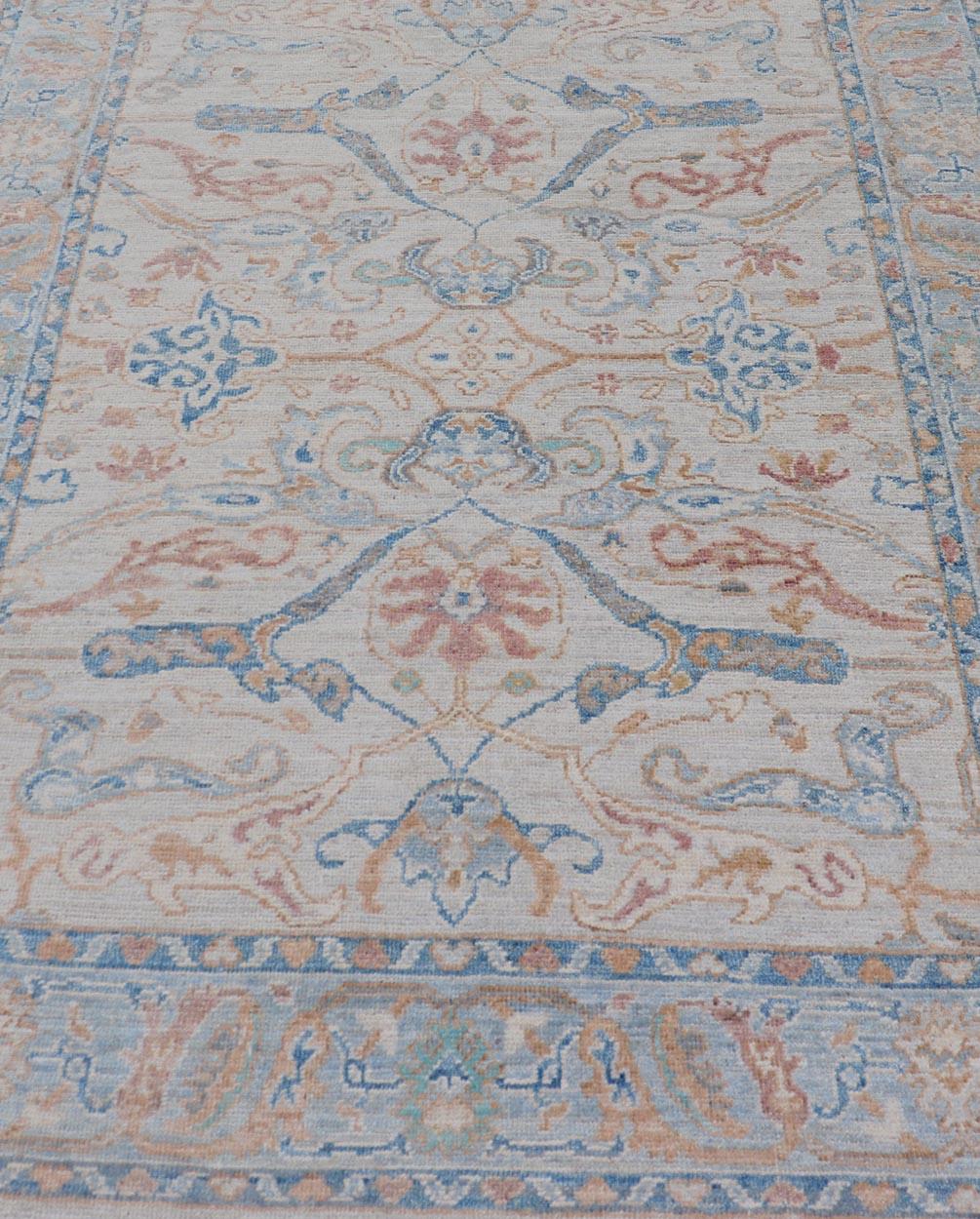 Afghan Arabesque All-Over Hand Knotted Oushak Designed in Ivory and Blue Tones For Sale