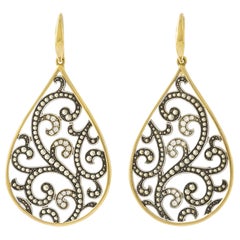 Arabesken-Diamanten auf Gelb- und Weißgold-Ohrringen