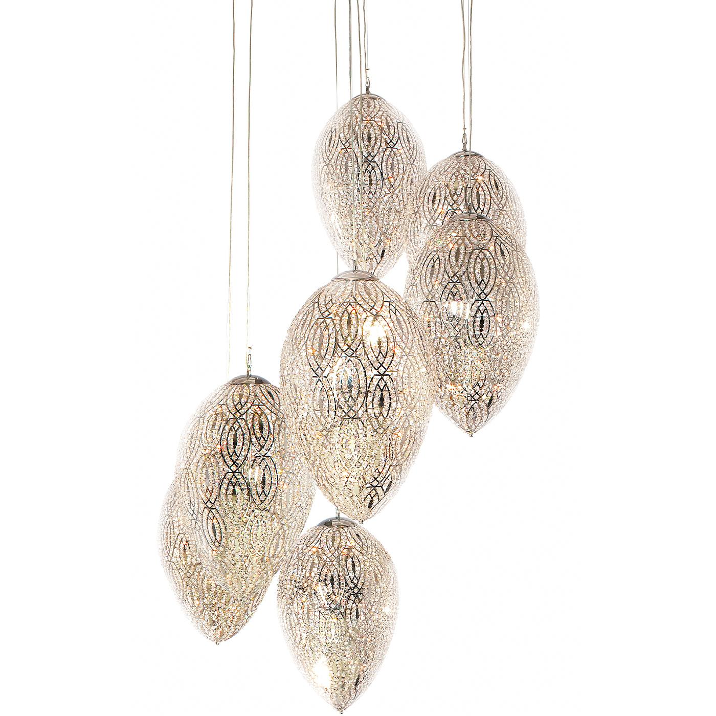Evoking the mesmerizing stalactites in century-old caves, this pendant lamp creates a dramatic look and captivating ambiance in any interior. Arranged at different heights to form a spiral display, seven egg-shaped elements (each housing a G9 LED)