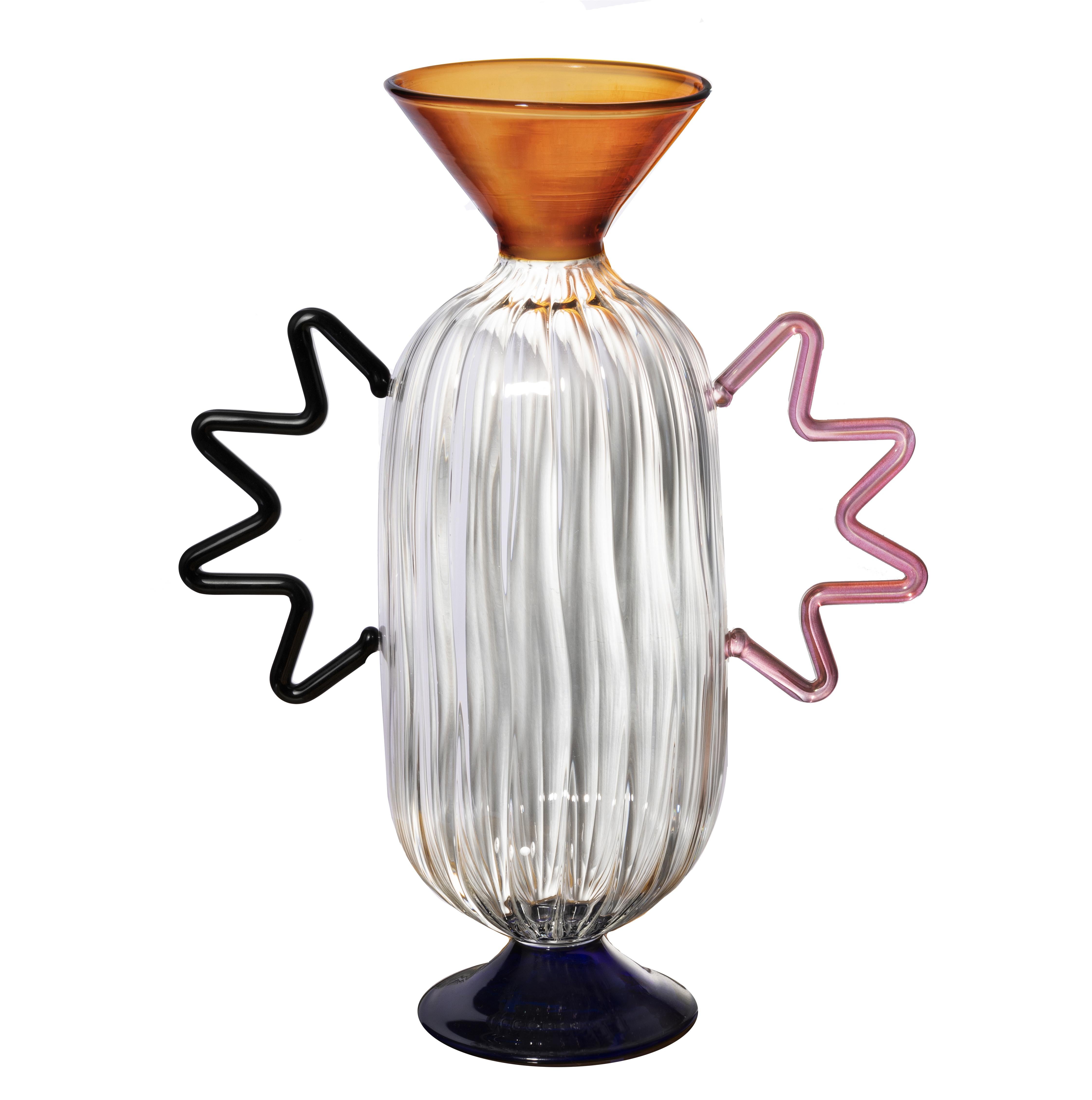 Arabesque 02 glass vase by Serena Confalonieri
Dimensions: D 12 cm x H 35 cm
 Total width 27 cm
Materials: Hand blown Borosilicate glass 
Glass colors: Transparent, blue, amber, black, pink

Hand blown borosilicate glass vase.

Serena