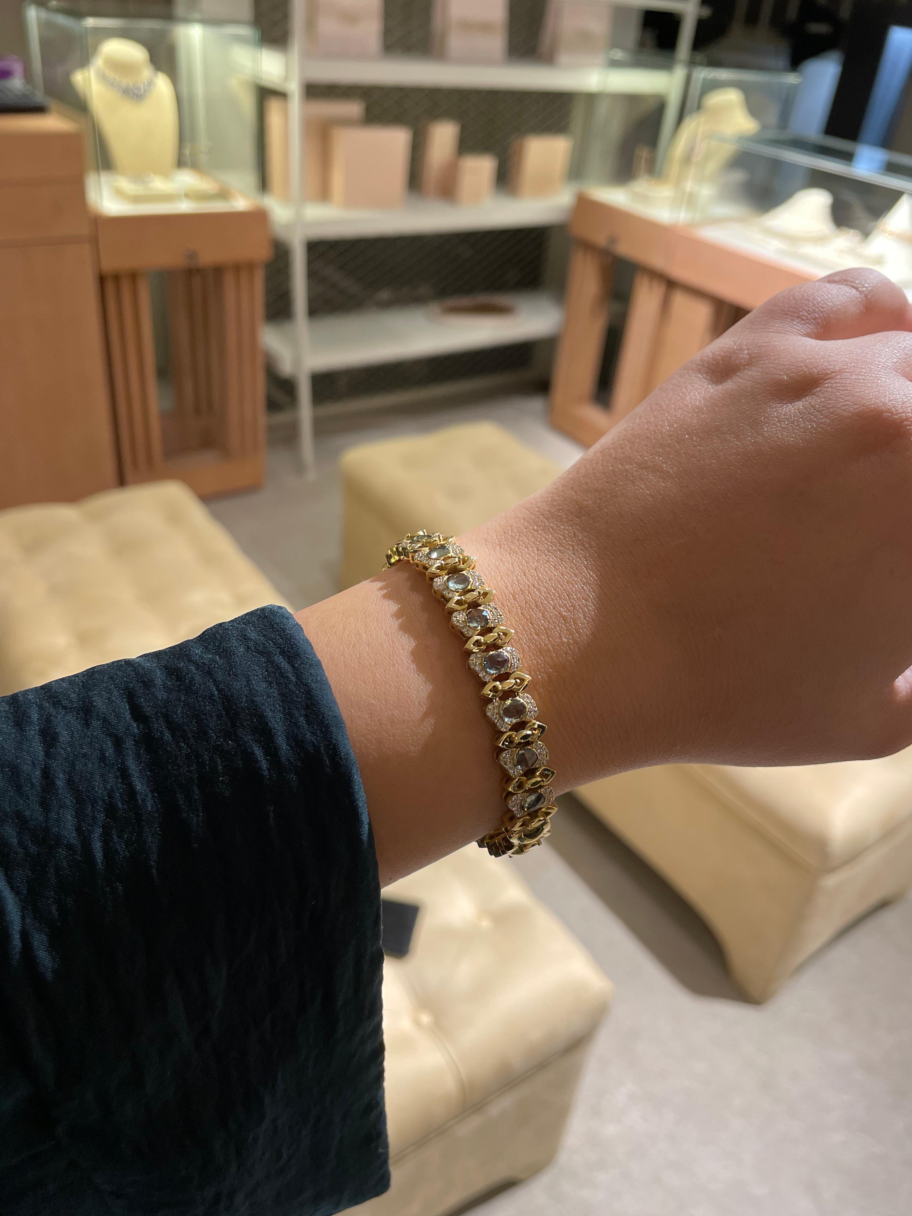 Art Deco Ruwaya Yellow gold green sapphire bangle  with Diamonds For Sale