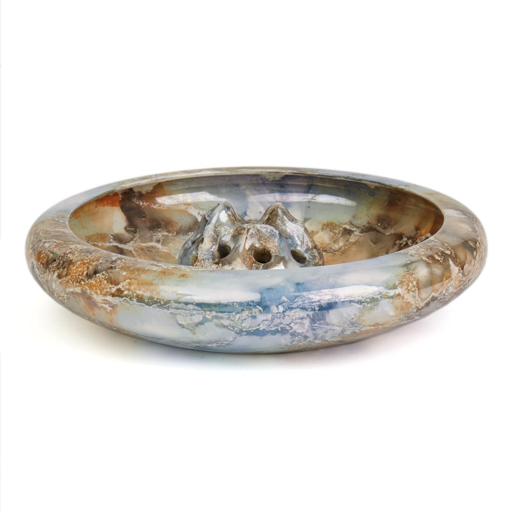 A stunning and scarce Art Deco Finnish Arabia art pottery flower bowl with removable central matching flower brick decorated in silver and brown lustre glazes in a marbled effect. The earthenware bowl is of wide shallow form with the flower brick