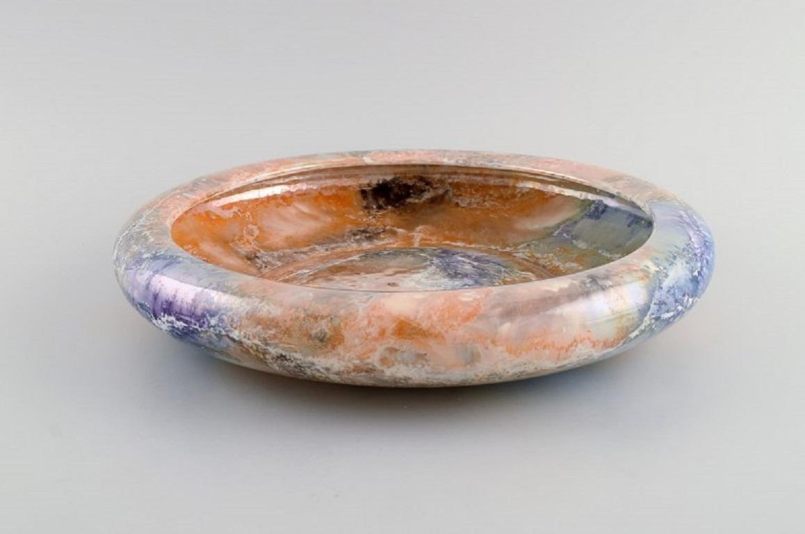 Arabia, Finland. Art deco bowl in glazed faience. Beautiful marbled glaze. 
1920s/30s.
Measures: 27 x 5 cm.
In excellent condition.
Stamped.