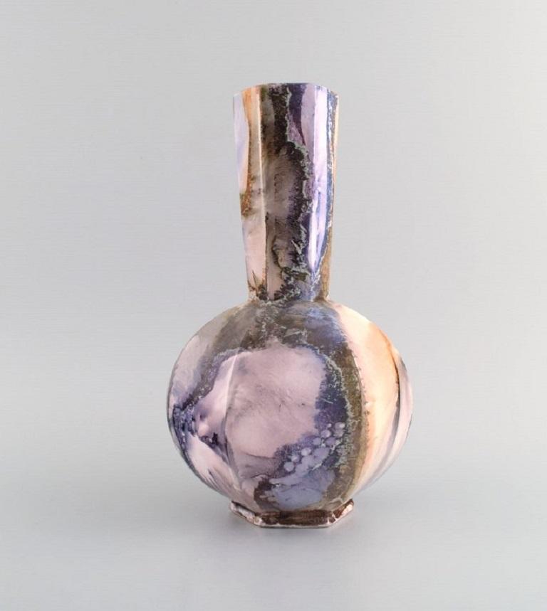Arabia, Finland. Art Deco vase in glazed faience. Beautiful marbled glaze. 
1920s/30s.
Measures: 27.5 x 17 cm.
In excellent condition.
Stamped.