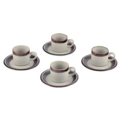Arabia, Finland. "Karelia". Four sets of coffee cups and saucers in stoneware.