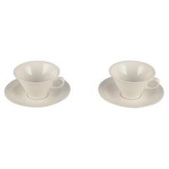 Arabia, Finland, Two sets of "Harlekin" tea cups and saucers in white porcelain.