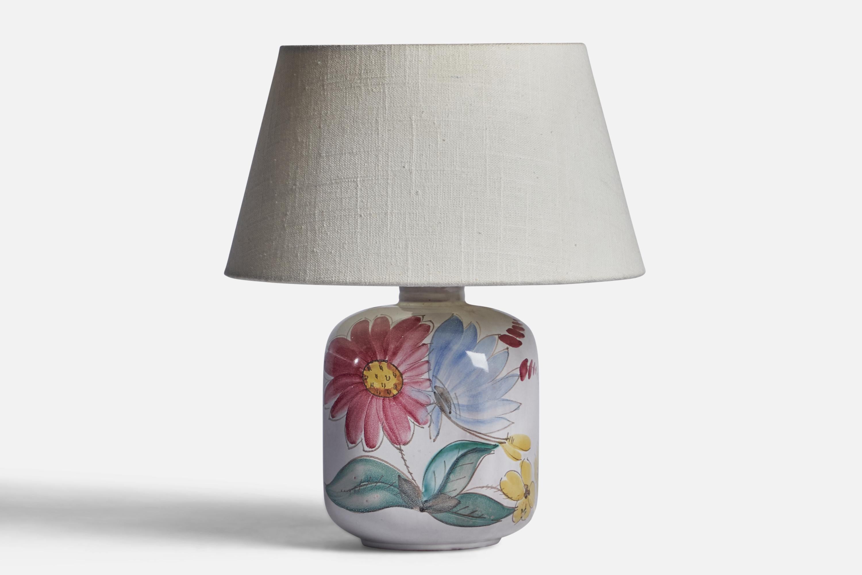 A white-glazed and hand-painted stoneware table lamp produced by Arabia, Finland, c. 1940s.

Dimensions of Lamp (inches): 9.1” H x 5” Diameter
Dimensions of Shade (inches): 7” Top Diameter x 10” Bottom Diameter x 5.5” H 
Dimensions of Lamp with
