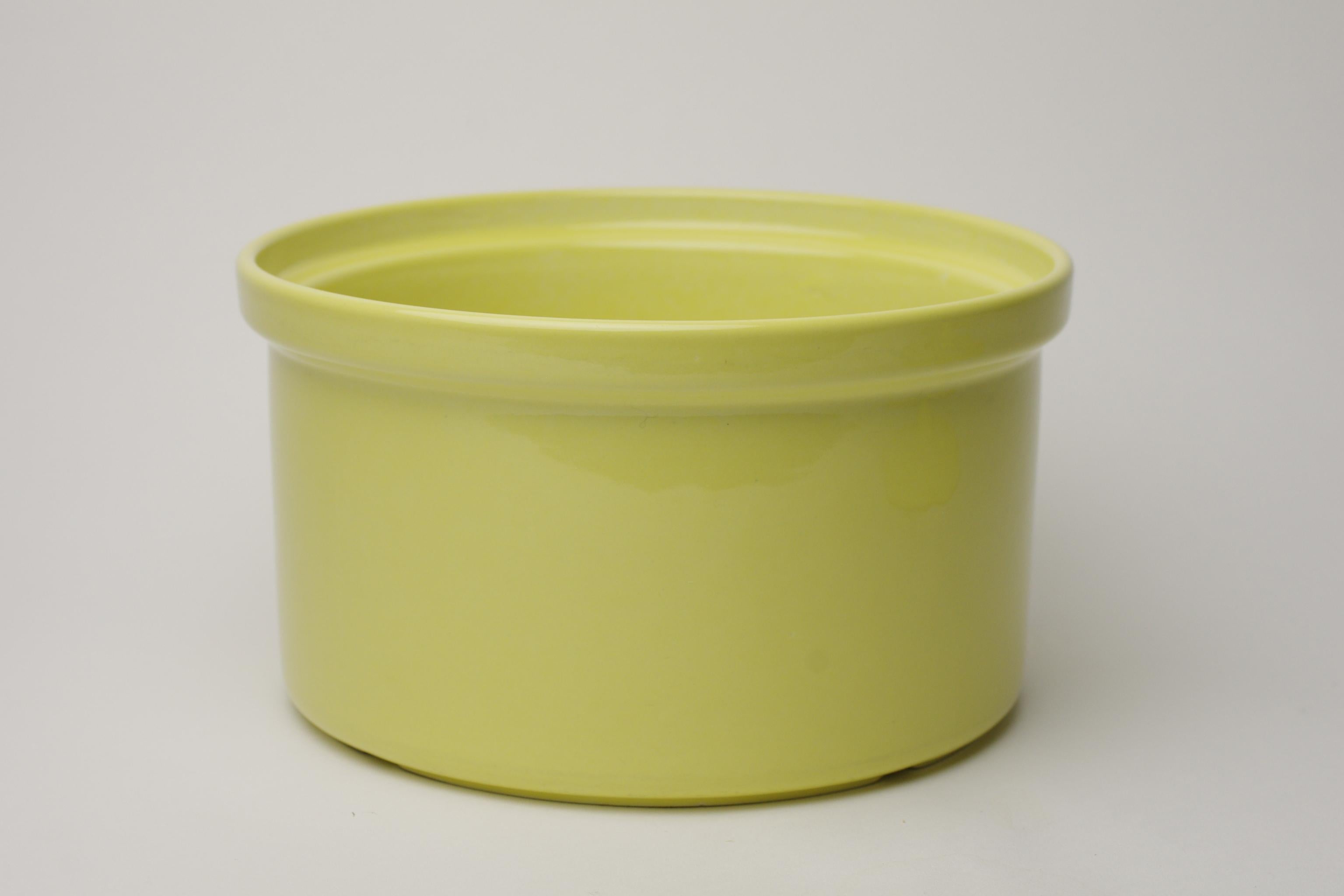 yellow tupperware sugar container