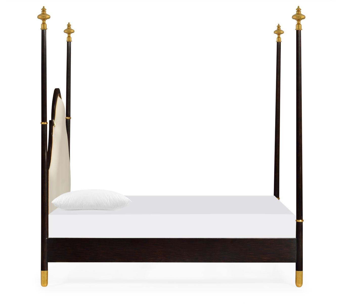 A stunning, handcrafted four-poster bed in leather and gold leaf detailing. 

Finished in ebony, this bed features a wonderfully curved headboard upholstered with genuine leather in cream. Paying close attention to detail, the piece features