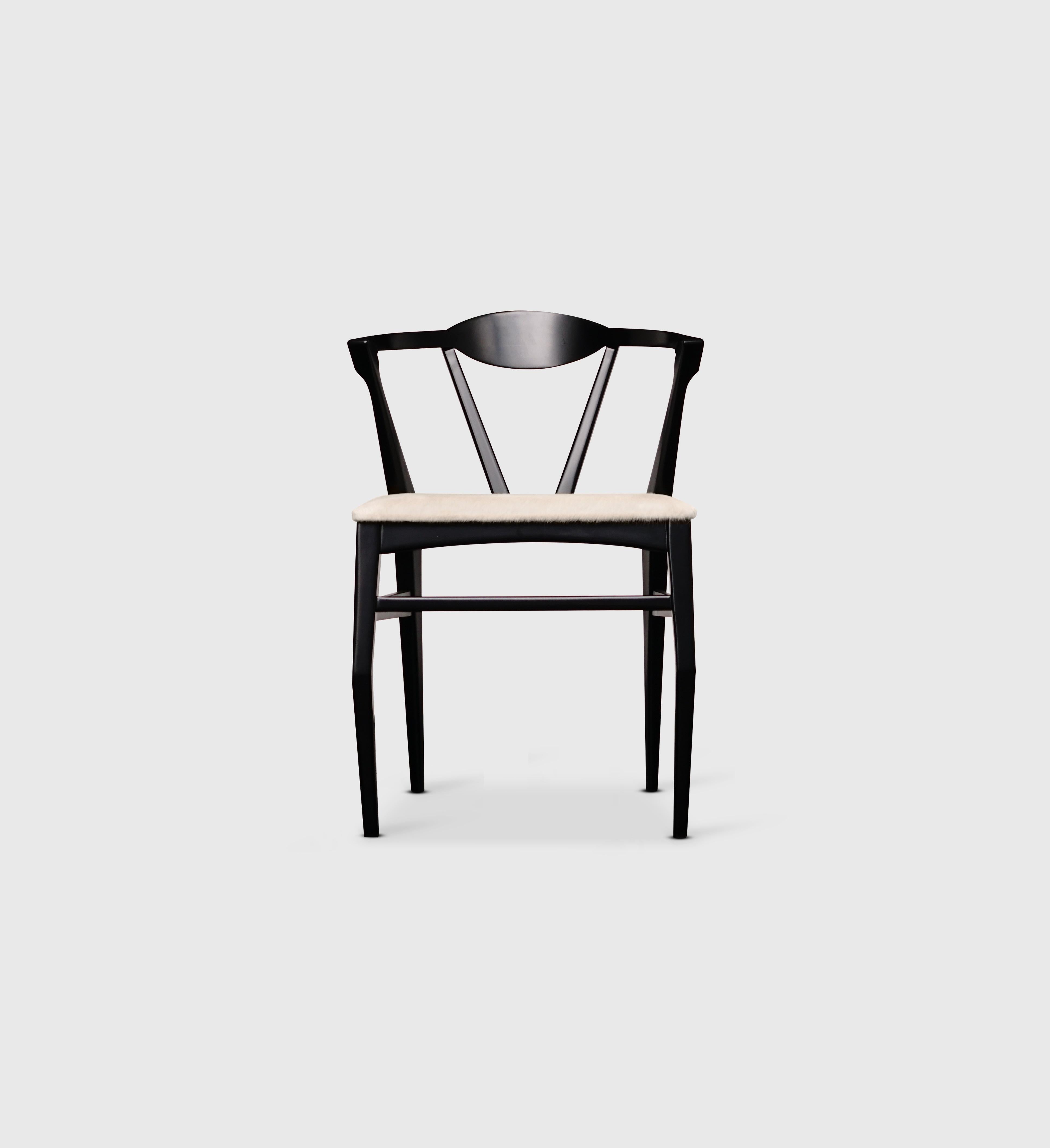 Arachnid dining chair by Atra Design
Dimensions: D 93 x W 53 x H 84 cm
Materials: walnut wood, fabric
Available in leather, rattan or fabric. Available in walnut, beech, maple or mohogamy wood frame.

Atra Design
We are Atra, a furniture brand
