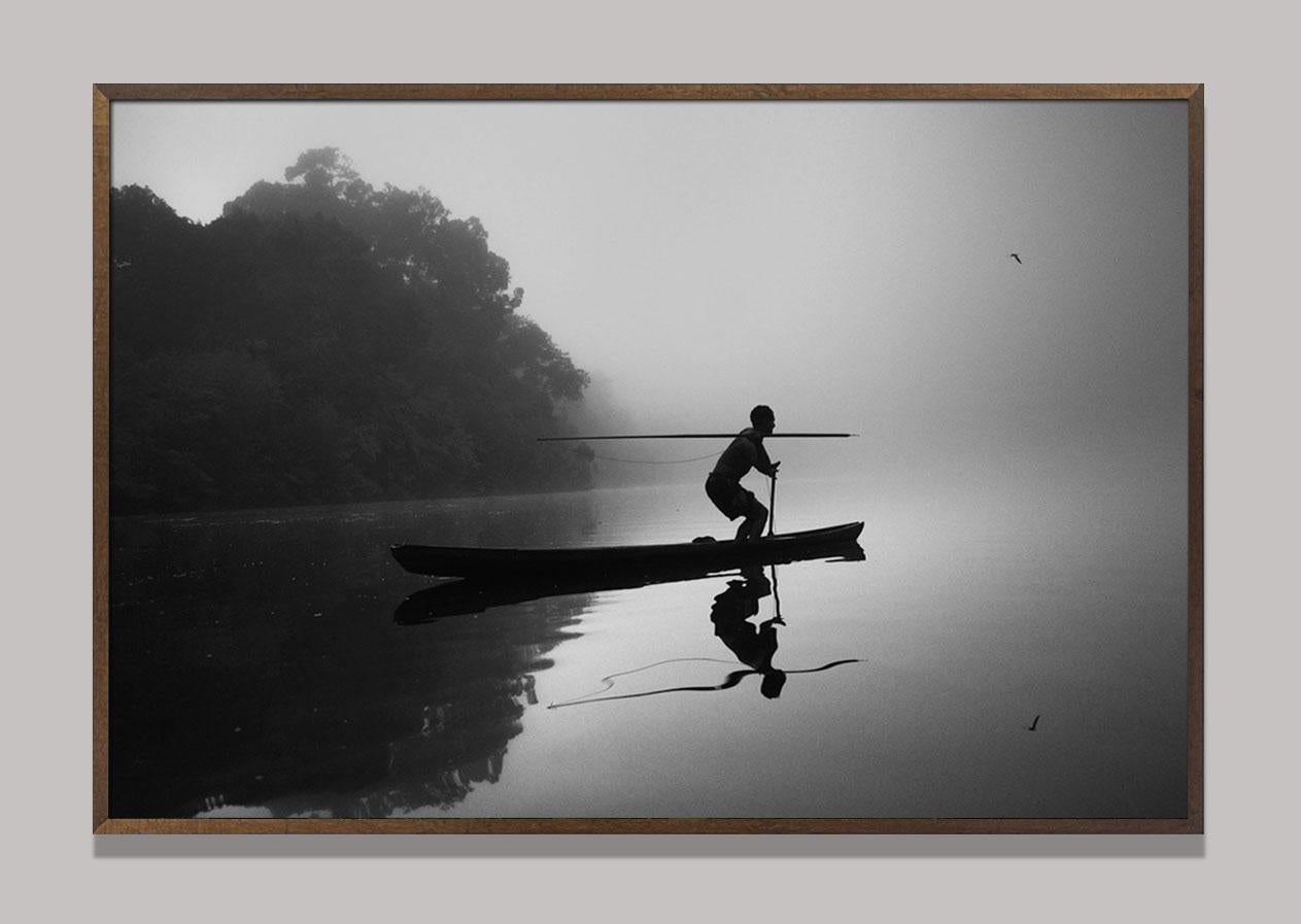 Pirarucu Fisherman, Jurua River, The Amazon Forest, Brazil - Contemporary Photograph by Araquém Alcântara