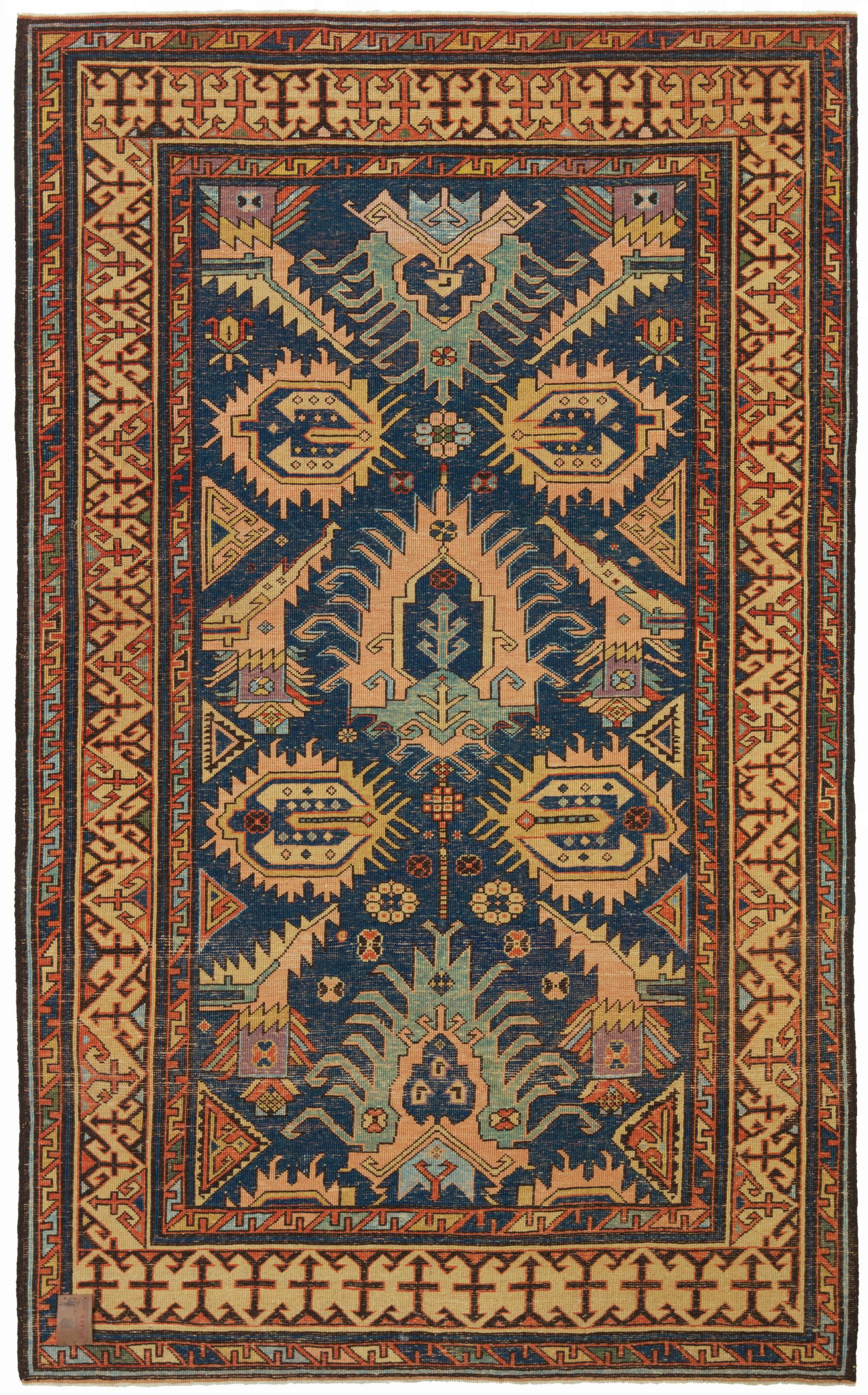 This is a Bidjov Kazak rug, designed late 19th century, is a type of handwoven rug that originated from the Caucasus region, specifically from the town of Bidjov, a few miles north of Marasali. As with many place names, the attribution to Bidjov is