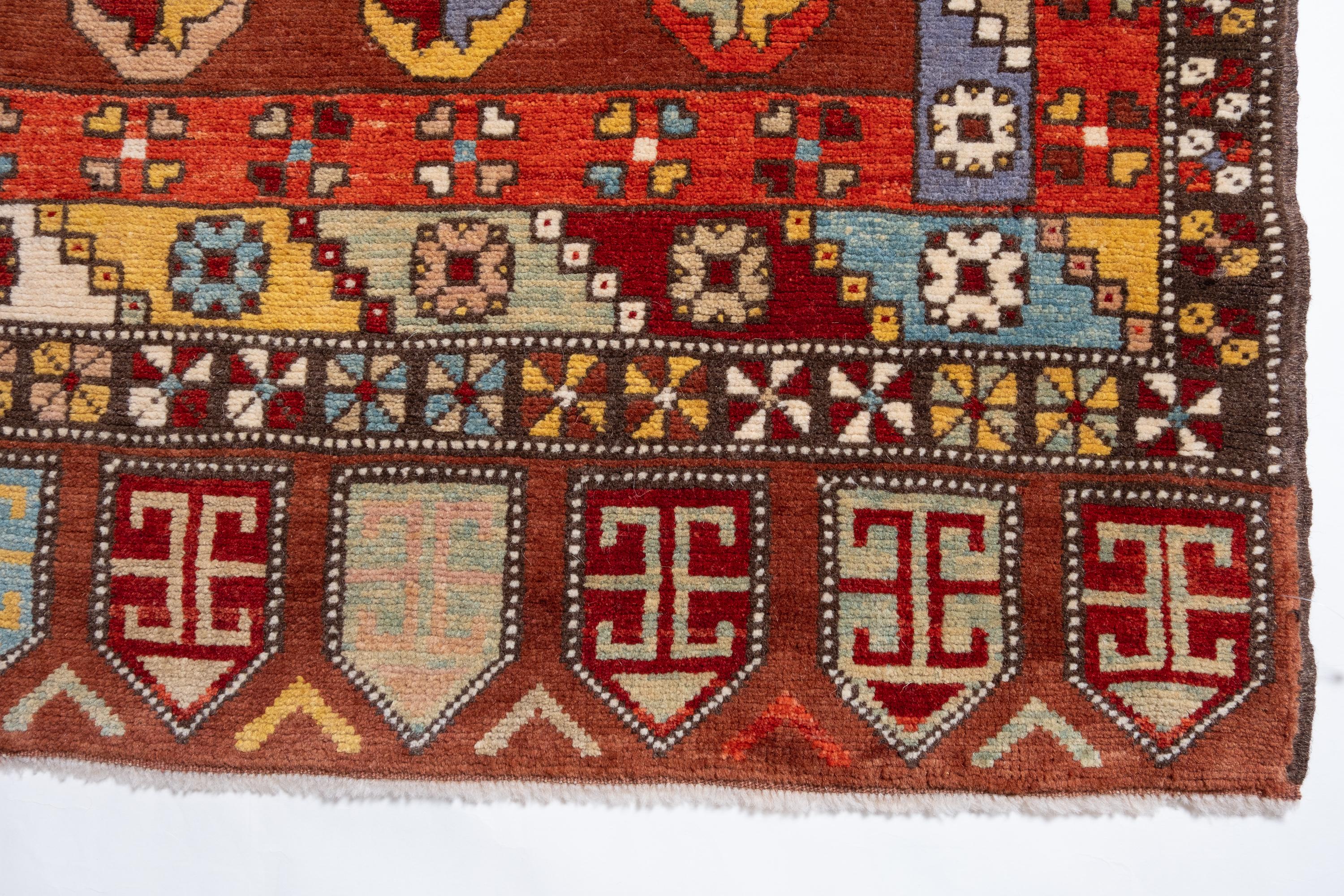 This is a dual medallion as the main element of the design of 18th-century carpet from the Konya region, Central Anatolia area of Turkey. Rugs of this type, using two medallions, appear frequently in 15th-century paintings of both the Venetian and