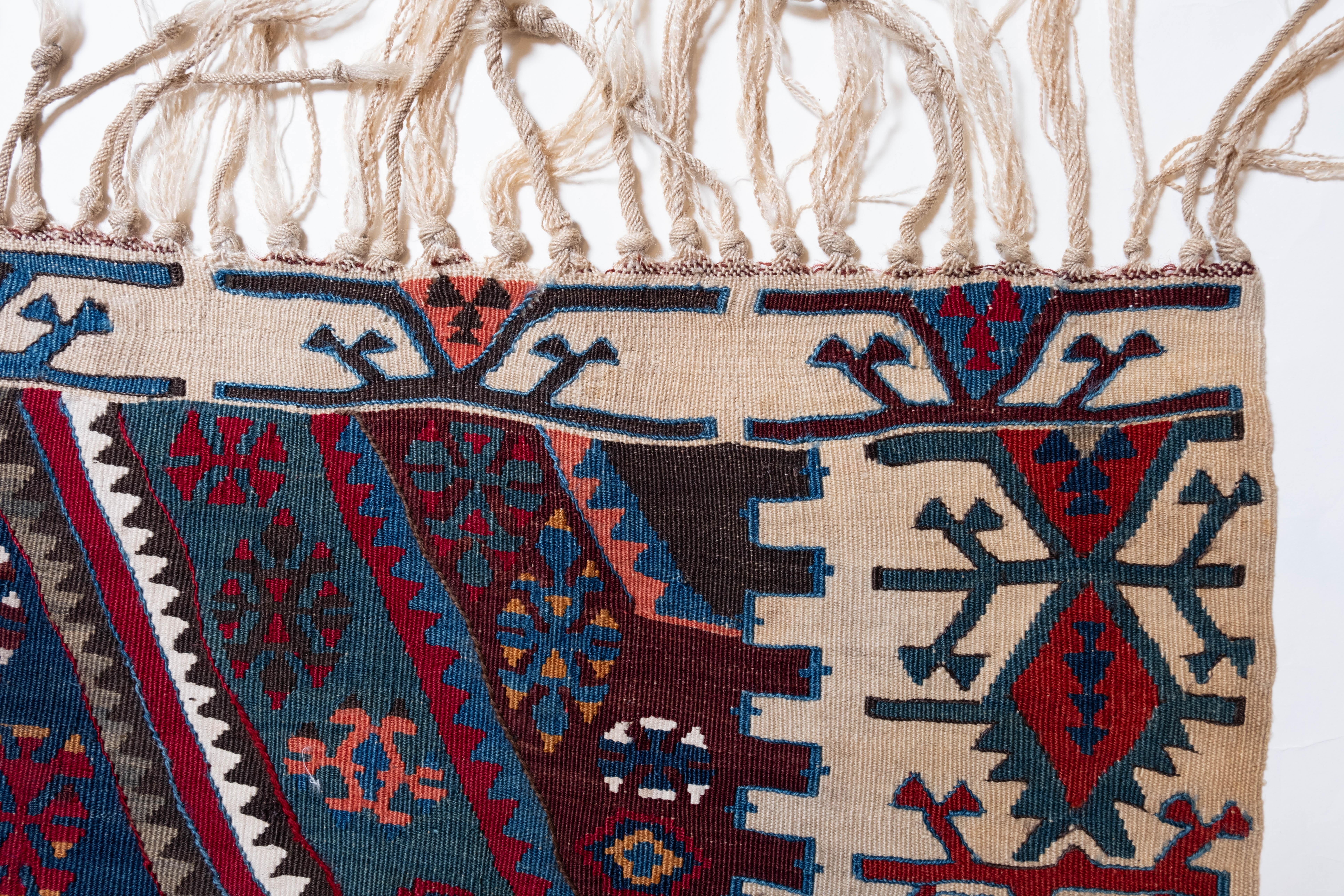 This is an Antique Kilim from the Aleppo region with a rare and beautiful color composition.

This highly collectible antique kilim has wonderful special colors and textures that are typical of an old kilim in good condition. It is a piece that