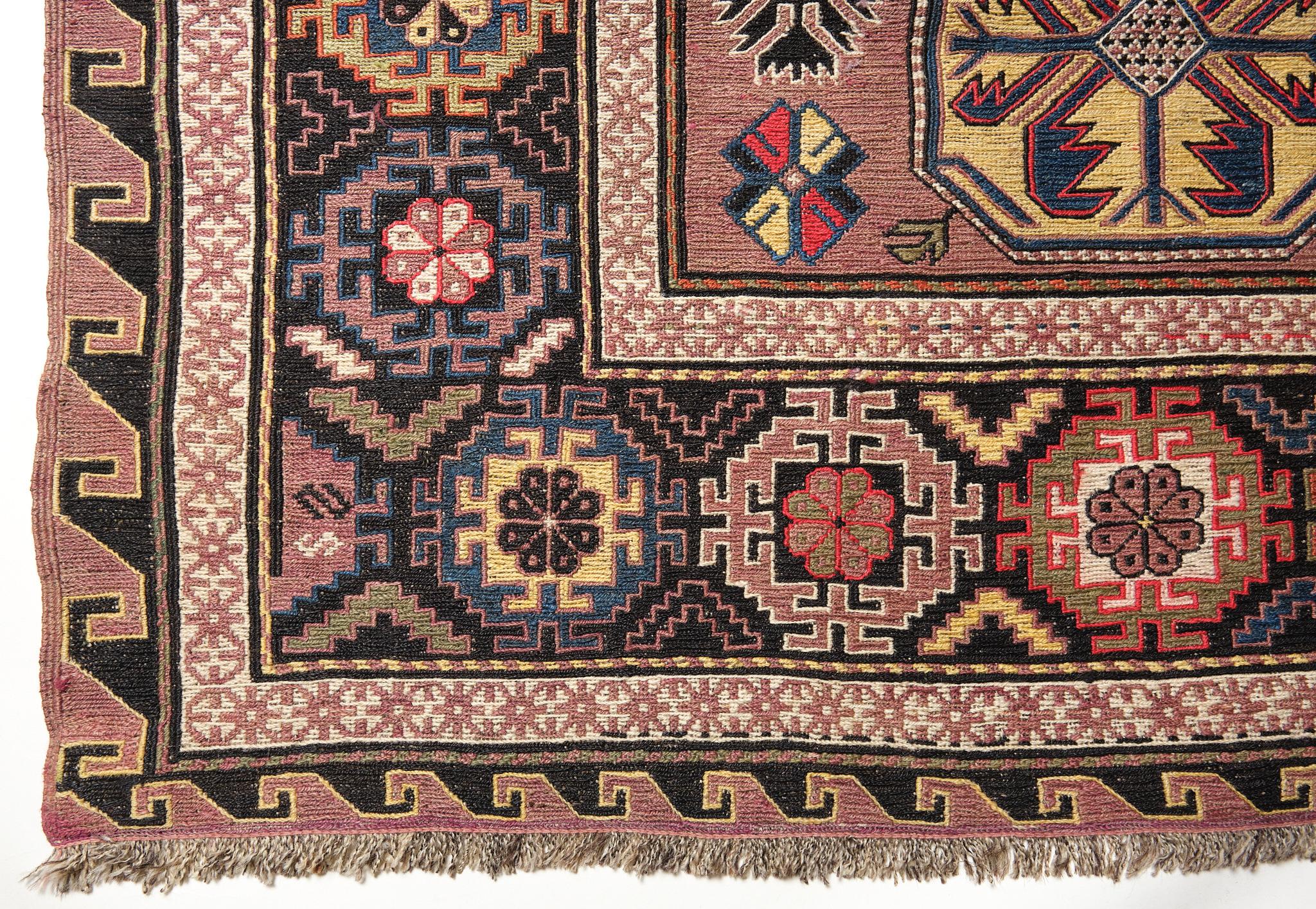 This is a large Antique Soumak ( Sumak, Sumac ) Kilim from the Caucasus region with a rare and beautiful color composition.

Of the four countries that make up the Caucasus, Azerbaijan produces the most kilims, and the land has a long history of