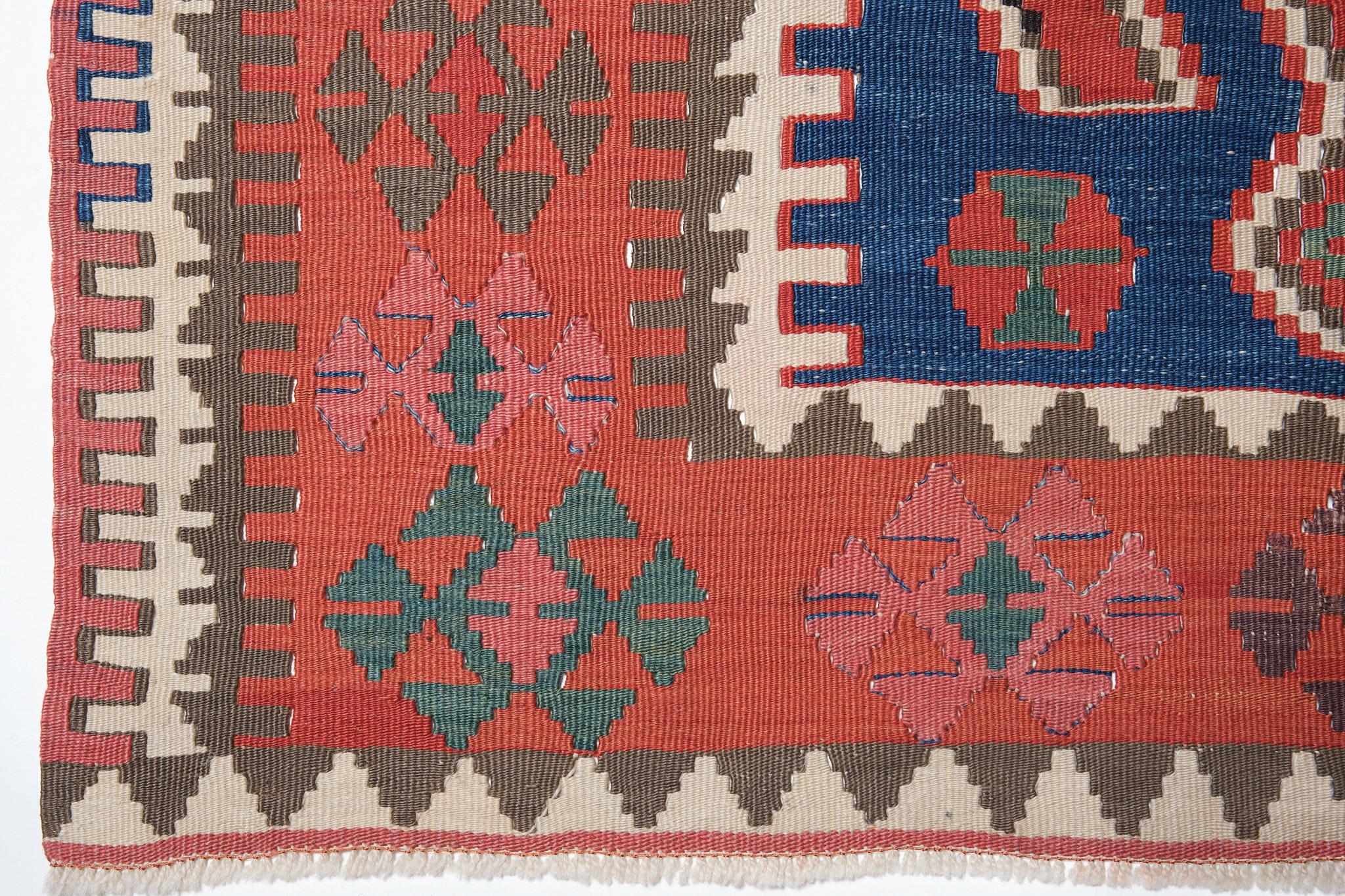 This is Central Anatolian antique Kilim from the Konya - Hotamis region with a rare and beautiful color composition.

It belongs to the scallop from the Konya region of Central Anatolia. This old kilim has a wonderful faded color and texture that is