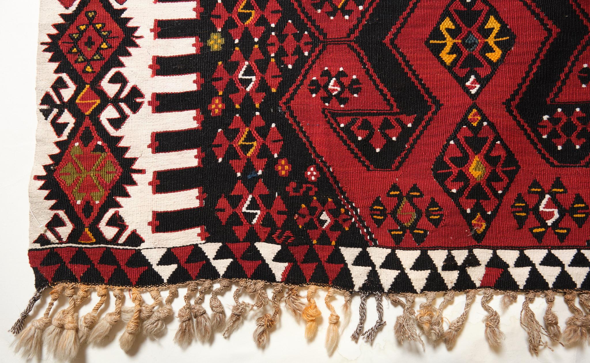 This is a Southern Anatolian Antique Kilim from the Malatya region with a rare and beautiful color composition.

Malatya is a town built on one main street that continues for a number of miles. It is situated in the Tohmasuyu River basin which is