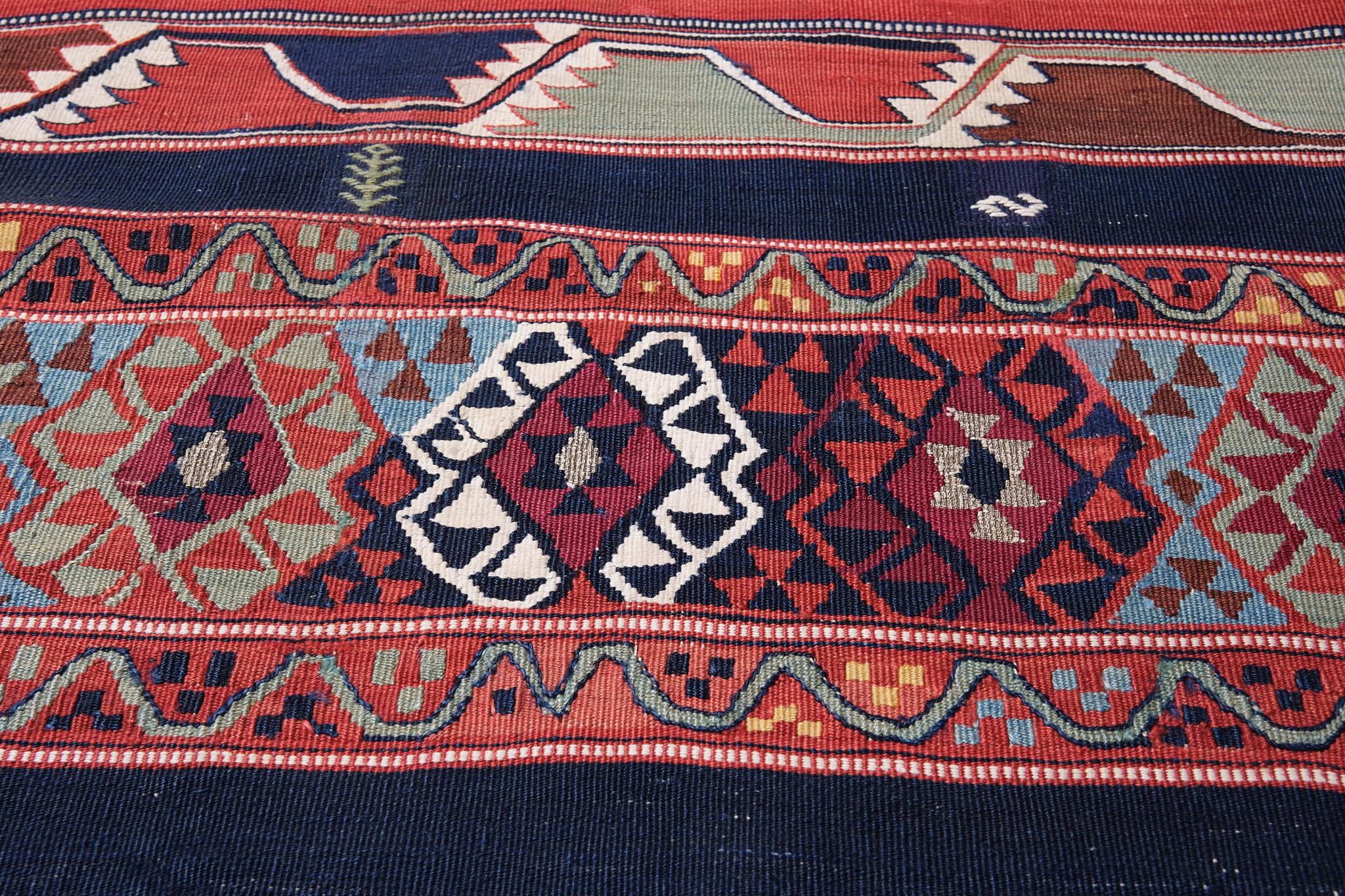 This is a South Eastern Anatolian Antique runner Kilim from the Malatya region with a rare and beautiful color composition.

Malatya is Turkey's main kilim production area, and there are many variations. This is one of them, a runner-type kilim.