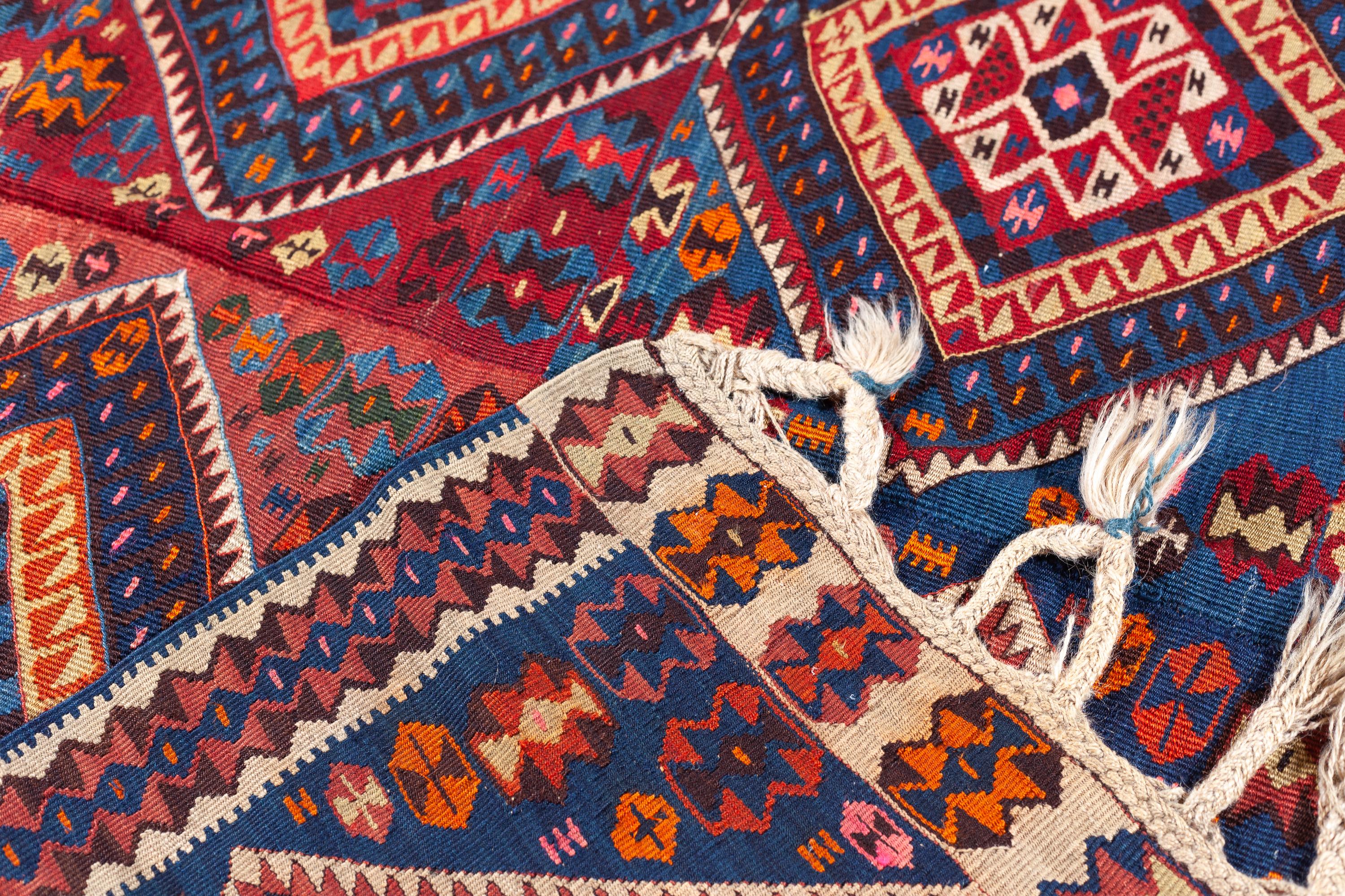 This is an Eastern Anatolian Old made in two halves Kilim from the Van region with a rare and beautiful color composition.

Van lies on the southeast side of Lake Van, which is the largest water mass in Anatolia, and the second largest in the