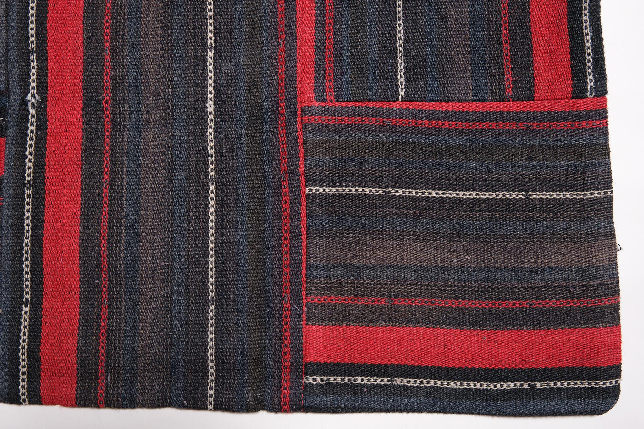 This is a Modern Kilim rug from Turkey with a rare and beautiful color composition.

It is a patchwork kilim rug by combining three types of narrow and long old kilims called Perde.
In real life, these kilims were woven into long strips, which