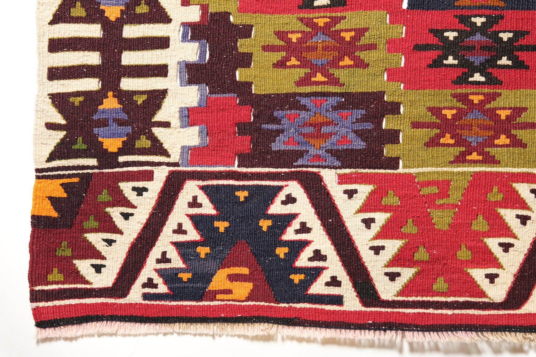 This is a Southern Anatolian made in two halves of old Kilim from the Adana region with a rare and beautiful color composition.

Adana Situated in the fertile Çukurova plain (previously known as the Cilician plain, through which the Seyhan and