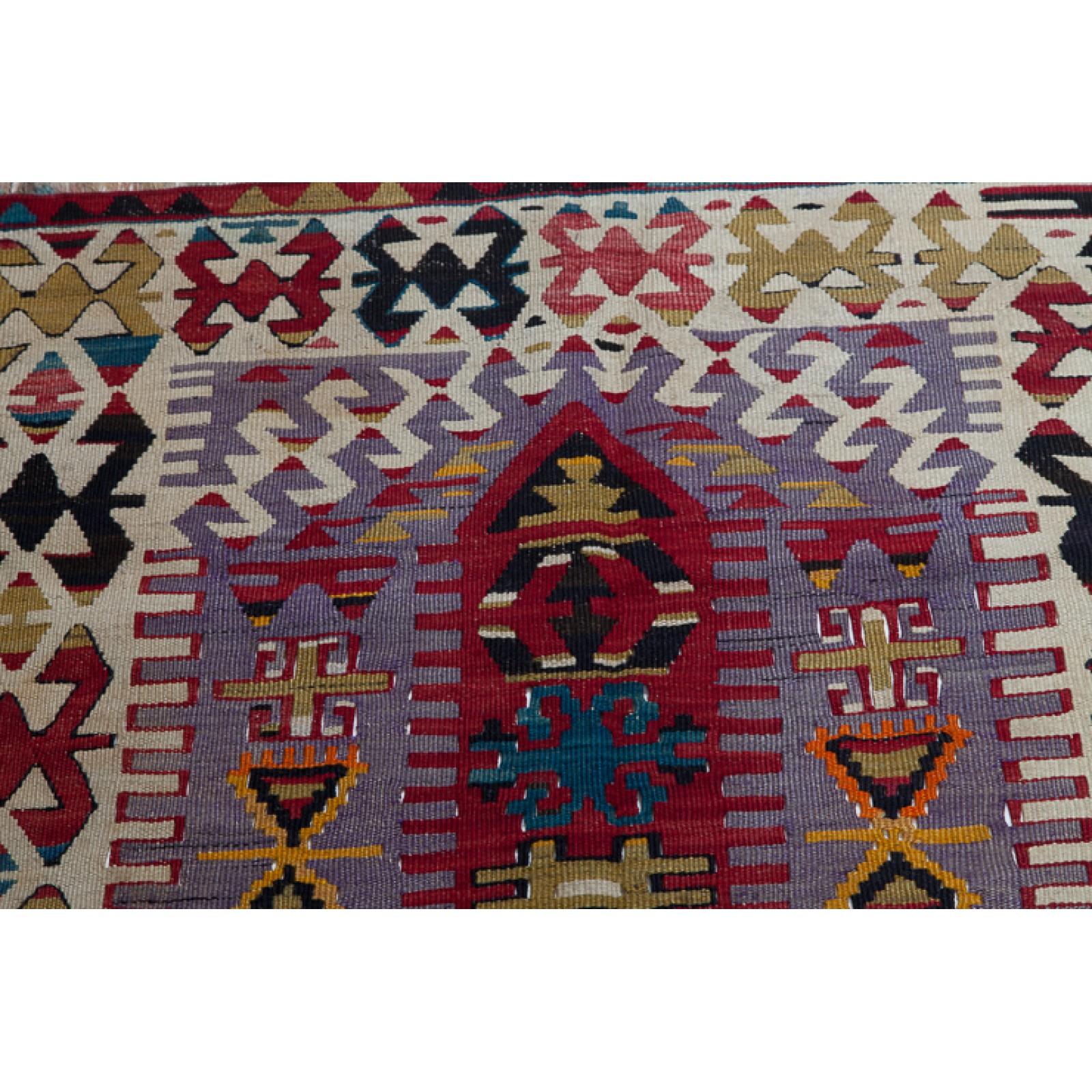 This is a Western Anatolian vintage Kilim from the Esme ( Eshme ) region with a rare and beautiful color composition.

This type of large Esme Kilims often features hexagonal medallions, either arranged in pairs or woven singly as central motifs,