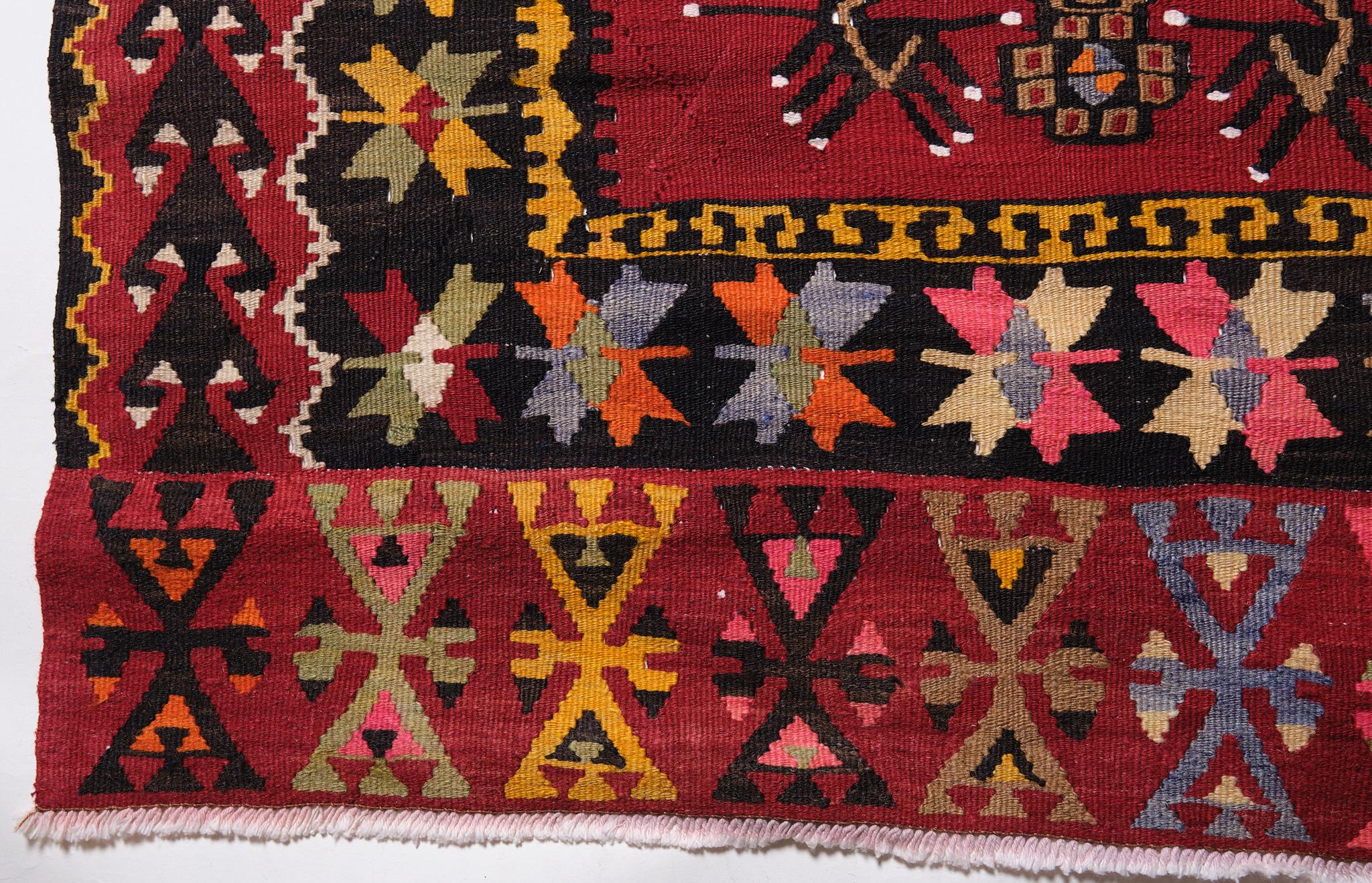 This is a Central Anatolian Old Kilim from the Sarkisla - Sivas region with a rare and beautiful color composition.

Sivas In the third century, Sivas was a Roman city known as Sebastea, the capital of Armenia Minor. Flourishing under Byzantine