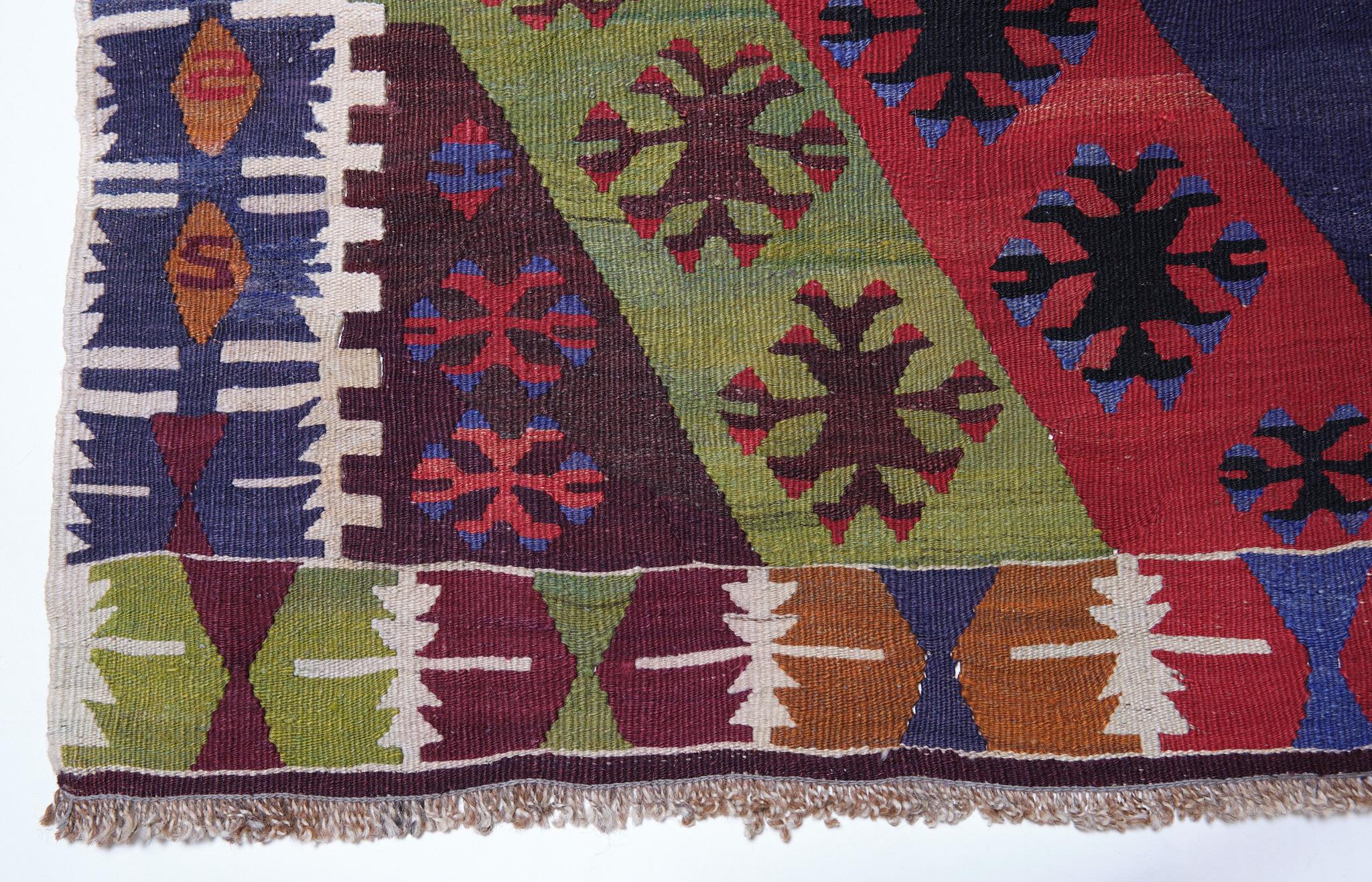 This is a South Eastern Anatolian old vintage Kilim from the Malatya region with a rare and beautiful color composition.

Malatya is a town built on one main street that continues for several miles. It is situated in the Tohmasuyu River basin