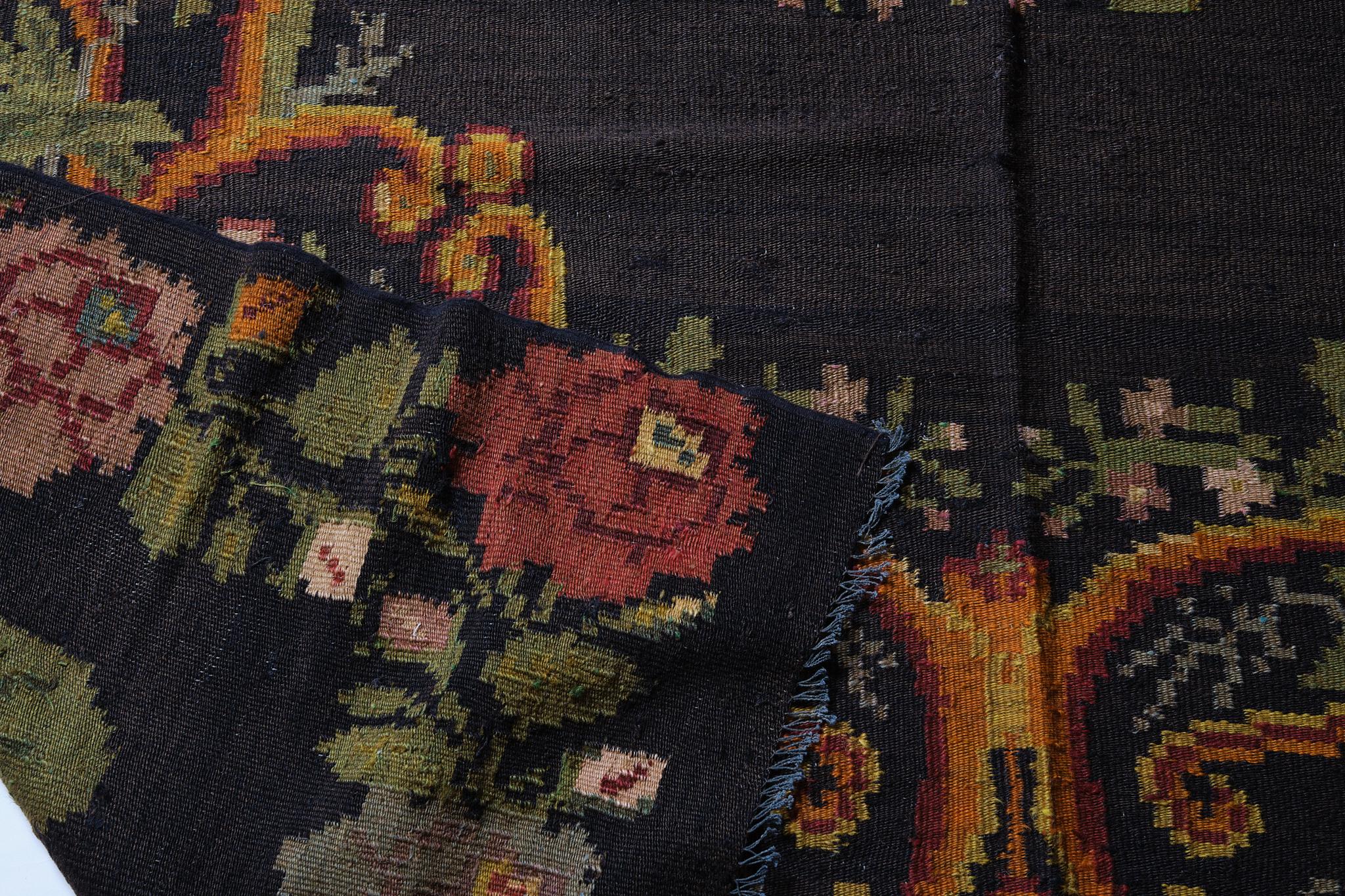 This is a Vintage Old Bessarabian Kilim Rug from Moldova with a rare and beautiful color composition.

Today it is a landlocked country in Eastern Europe, bordering Romania and Ukraine. Although it is now an independent country, it has been ruled