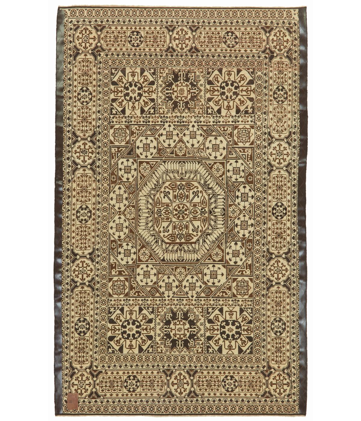 This rug with the central star was designed in the early 16th-century rug by Mamluk Sultane of Cairo, Egypt. Attempting to read early carpets produced in workshops in Cairo provides an entirely different set of challenges. Cairene carpets,