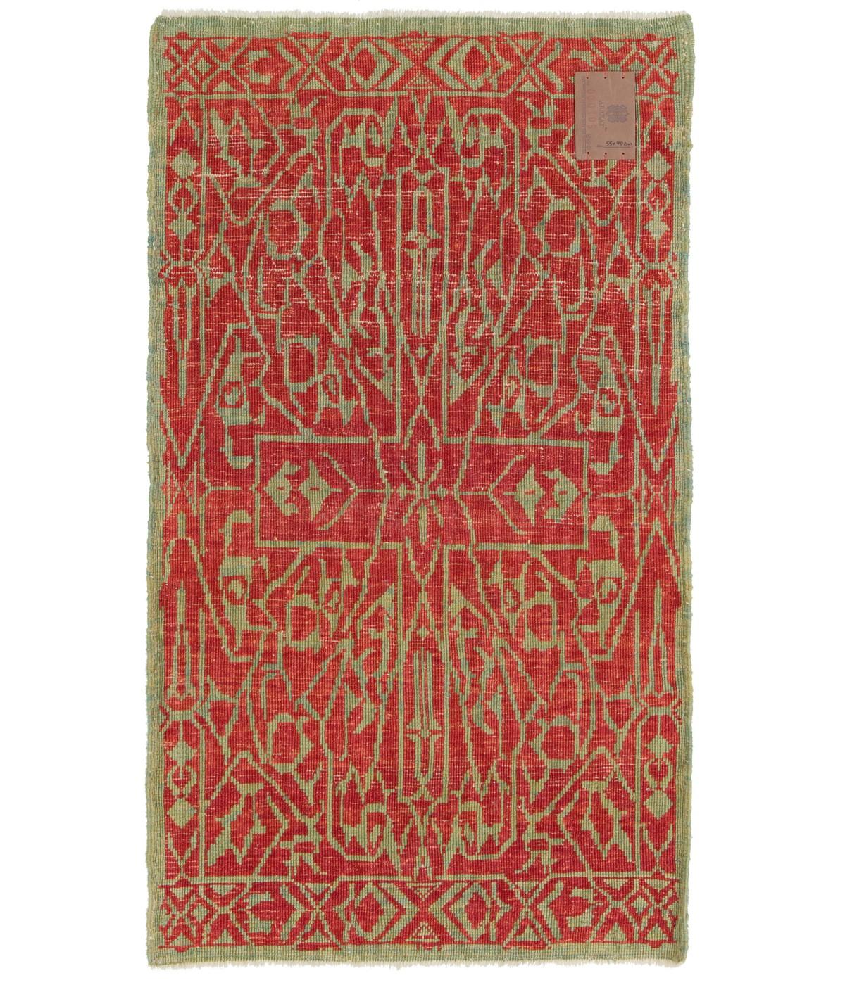 This geometric lattice pattern design rug has the impression that it is only part of a larger scheme-designed 15th-century rug from the Mamluk era, Cairo region, Eygpt. These designs have often been described as wagirehs or samplers and were said to