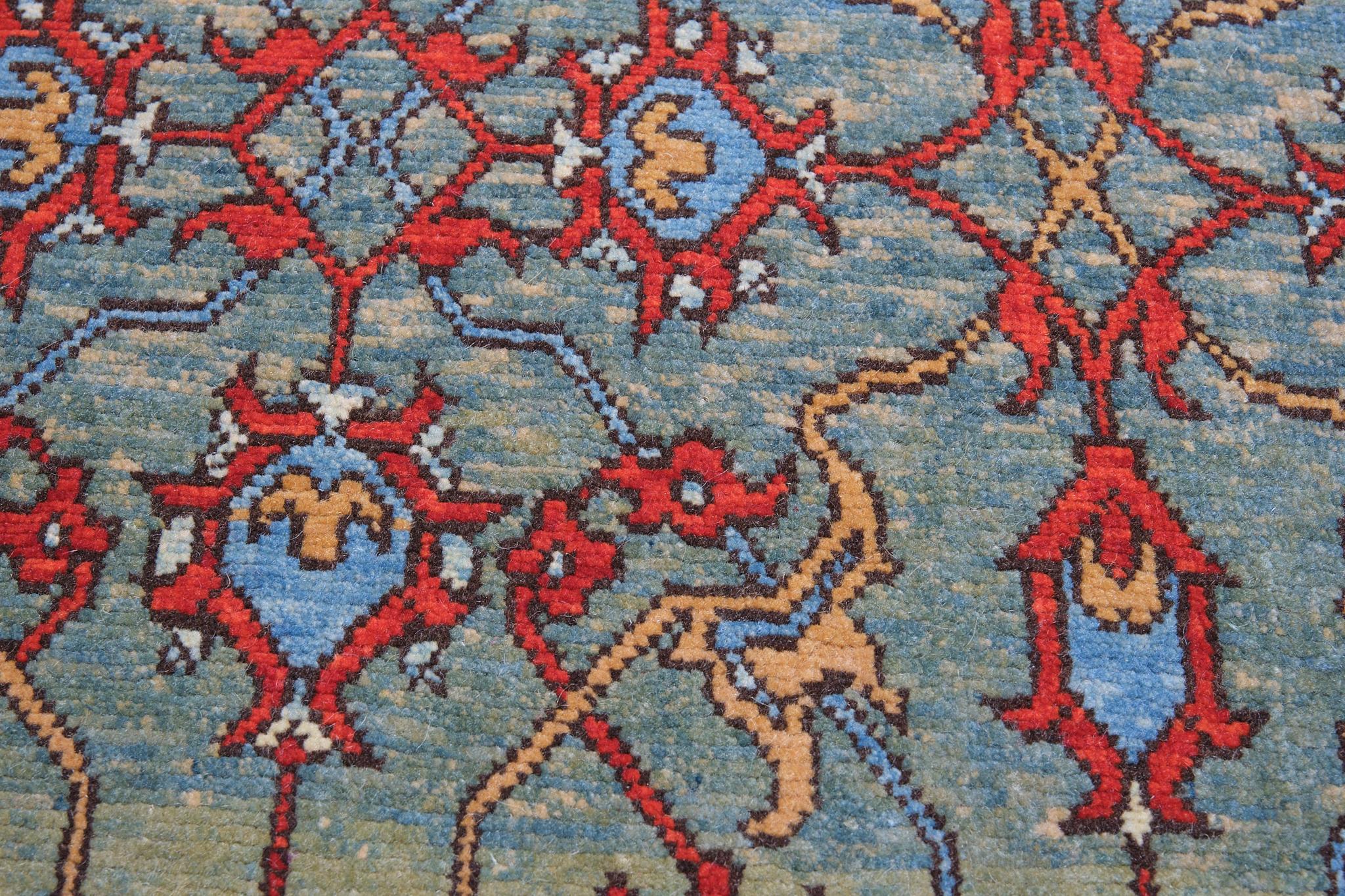 This rug has an interpreted design composed of a palmette lattice pattern taken from a part of the Mamluk rug, filling the field elegantly. These kinds of rugs have often been described as wagirehs or samplers and were said to have been used as