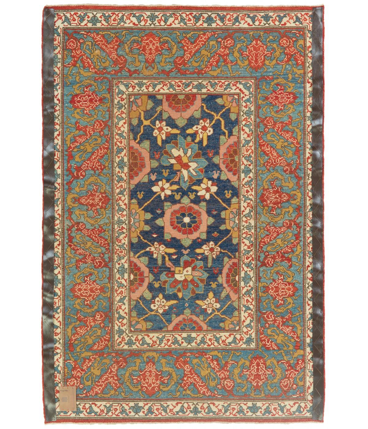 The design source of the rug comes from the book Antique Rugs of Kurdistan A Historical Legacy of Woven Art, James D. Burns, 2002 nr.4. This was an exclusive example of a Mina Khani lattice design mid-19th century rug from Koliya'i, Southern