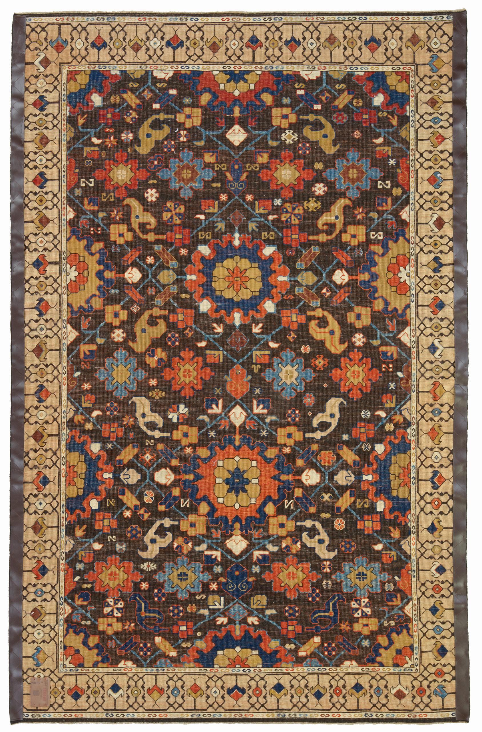 This offset pattern is composed of palmettes and flowers, one has the impression that it is only part of a larger scheme designed 19th-century rug from the Bidjar region, Eastern Kurdistan area. Very similar palmettes, drawn in a curvilinear manner