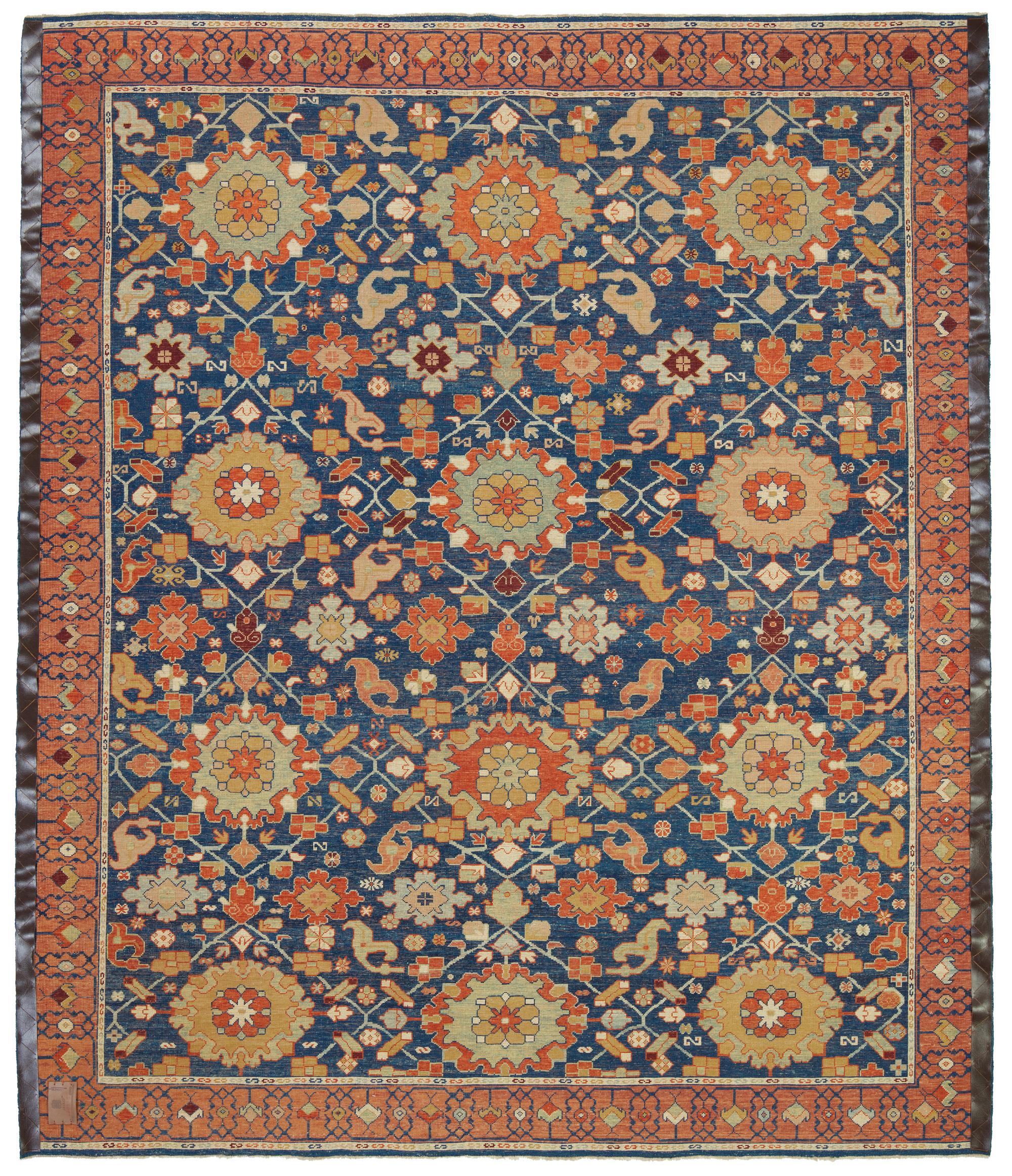 This offset pattern is composed of palmettes and flowers, one has the impression that it is only part of a larger scheme designed 19th-century rug from the Bidjar region, Eastern Kurdistan area. Very similar palmettes, drawn in a curvilinear manner