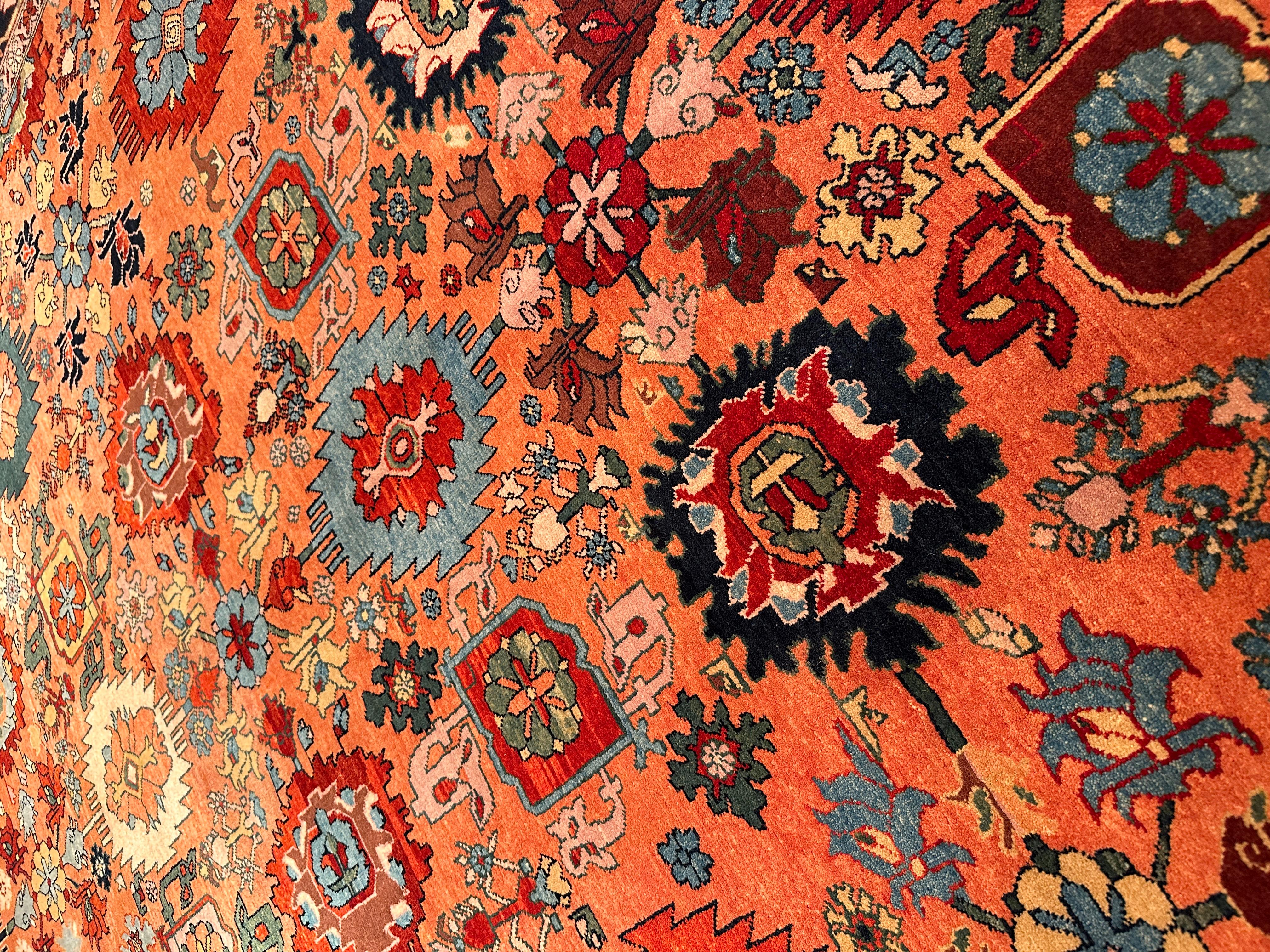 This offset pattern is composed of palmettes and flowers, one has the impression that it is only part of a larger scheme design 19th century rug from the Bidjar region, Eastern Kurdistan area. Very similar palmettes, drawn in a curvilinear manner