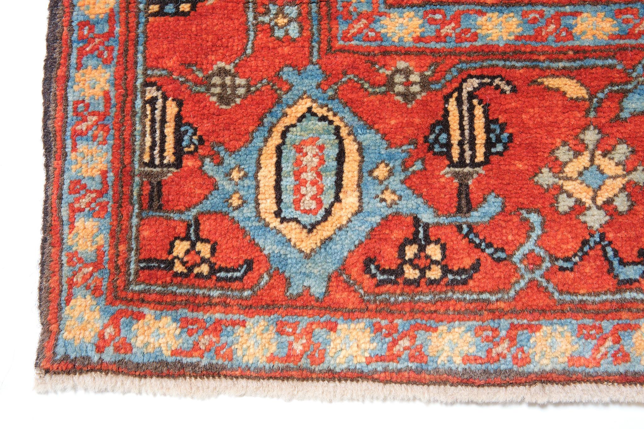 This offset pattern is composed of palmettes and flowers, one has the impression that it is only part of a larger scheme designed 19th-century rug from the Bidjar region, Eastern Kurdistan area. Very similar palmettes, drawn in a curvilinear manner