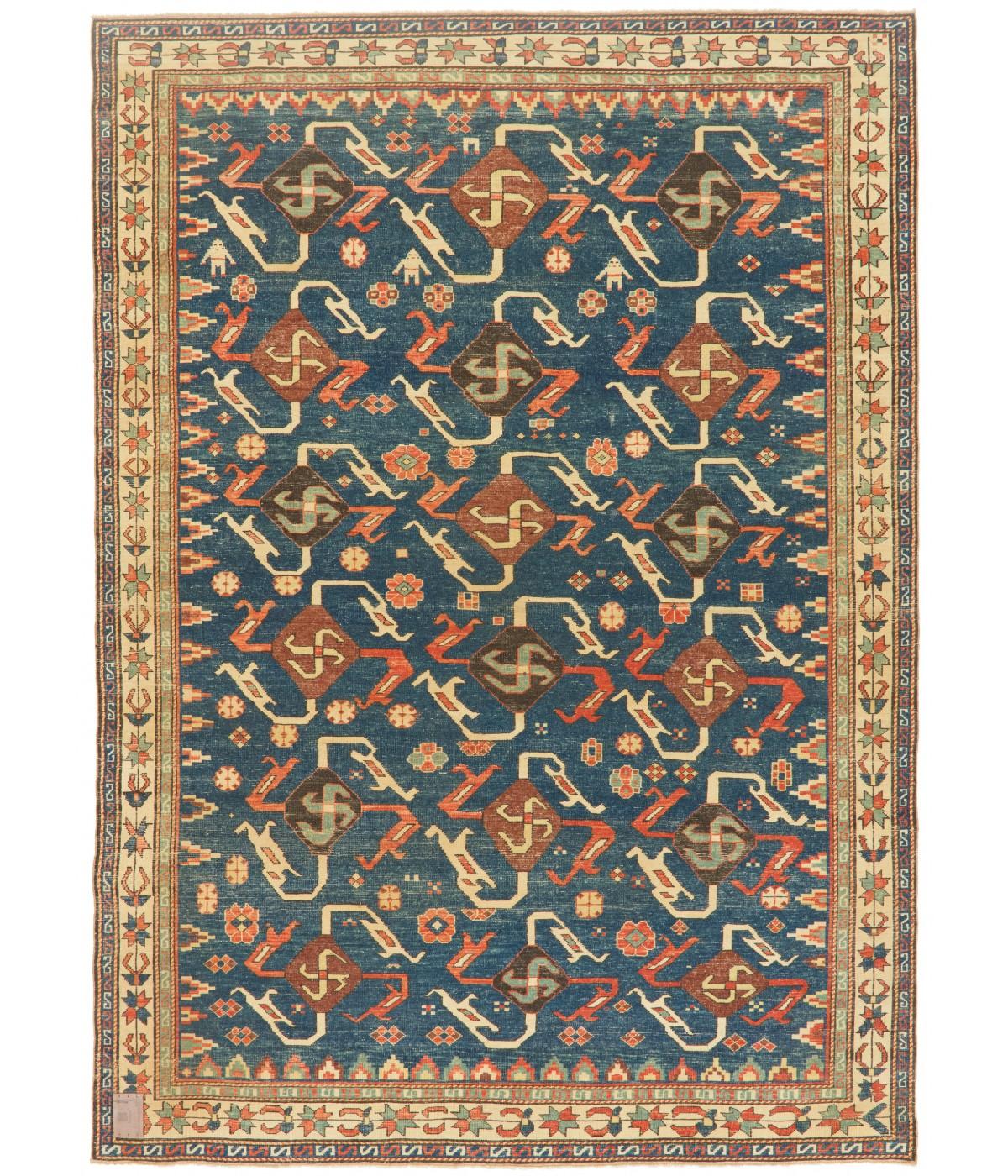 The source of rug comes from the book Orient Star - A Carpet Collection, E. Heinrich Kirchheim, Hali Publications Ltd, 1993 nr.17. This is a remarkable and very unusual swastika designed early 19th-century rug from the Central Caucasia area. This