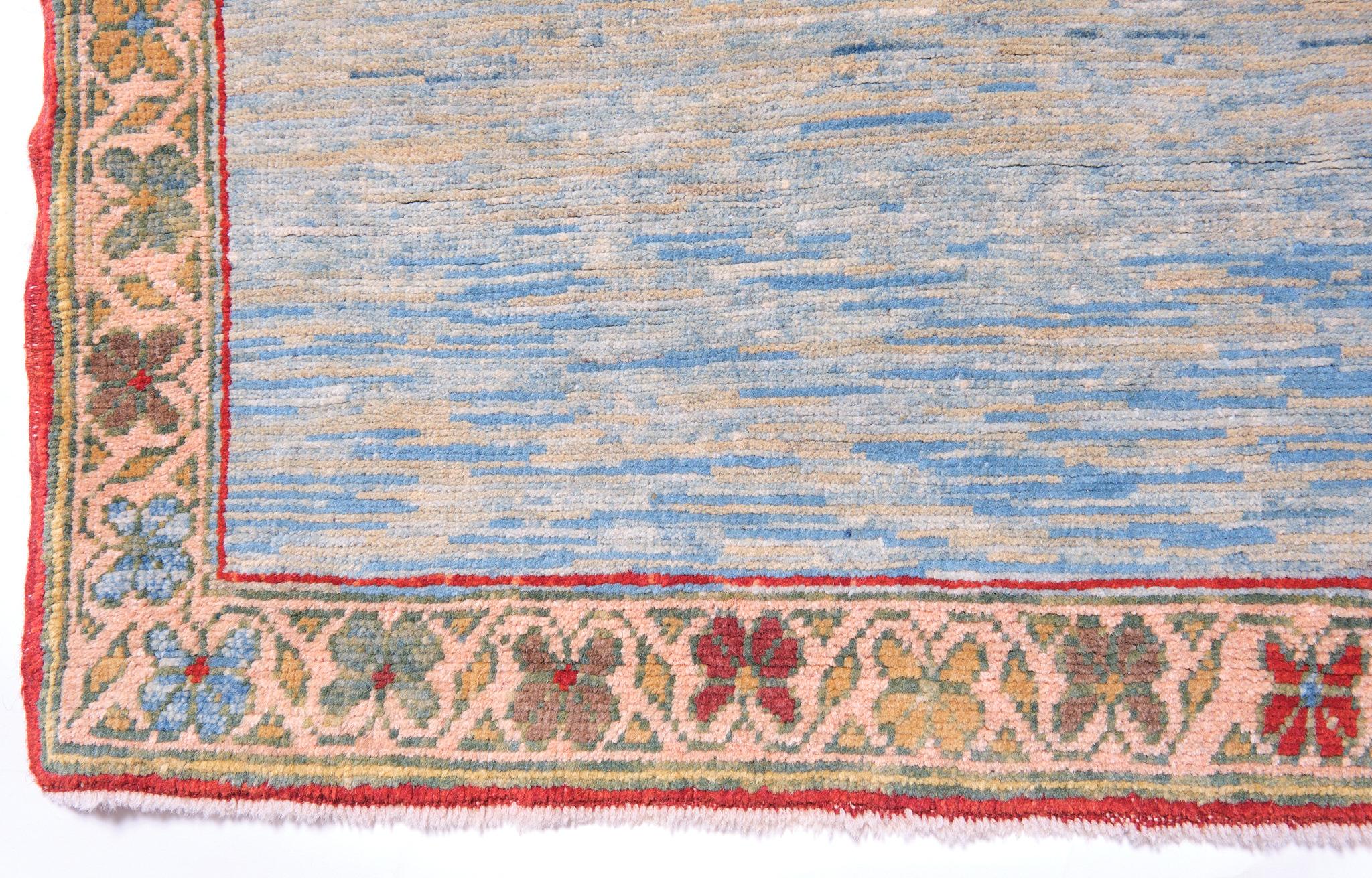 This unique design rug is interpreted by our designers with a mixture of Ararat Rugs’ soft blue tone natural dyed hand-spun yarns. This modern rug is reminiscent of a scene in impressionist river paintings, framed with colorful flowers.

Color