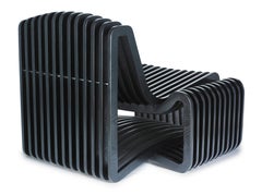 Arata Lounge Chair in a Dark Wood Finish