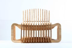 Arata Lounge Chair in a Natural Wood Finish